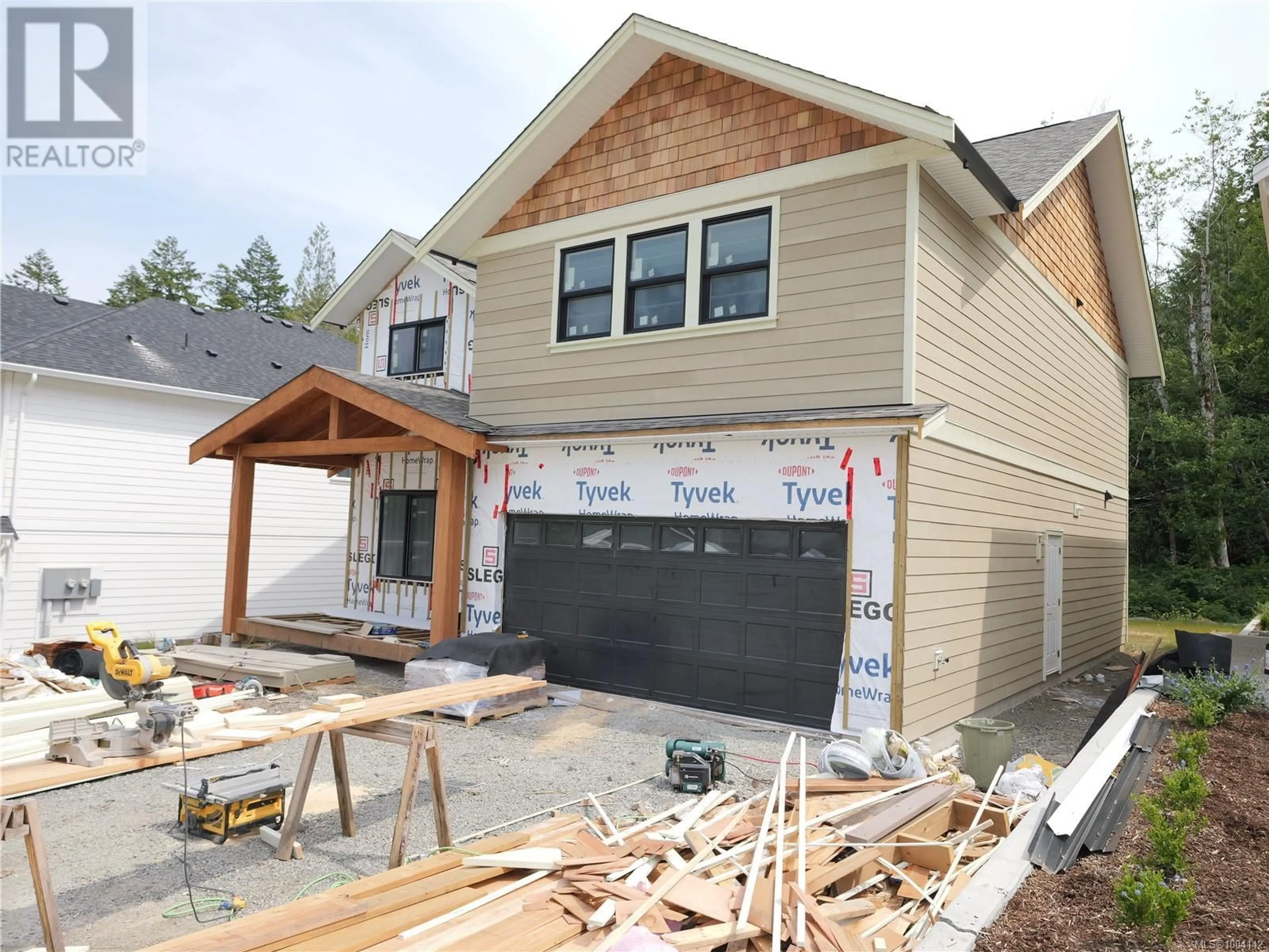Home with vinyl exterior material, street for 6923 RIDGECREST ROAD, Sooke British Columbia V9Z1P9