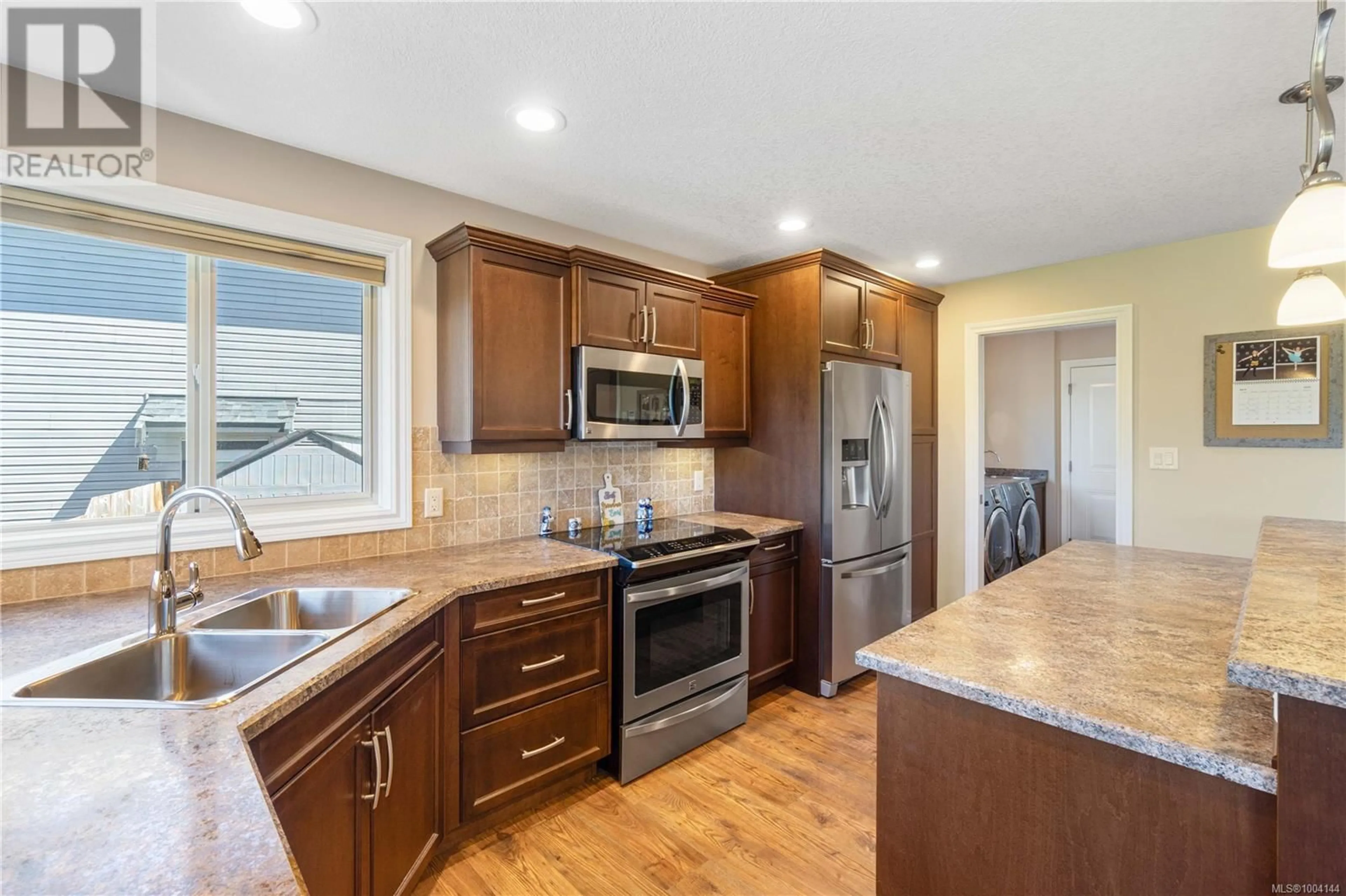 Open concept kitchen, unknown for 2130 VILLAGE DRIVE, Nanaimo British Columbia V9X0A7