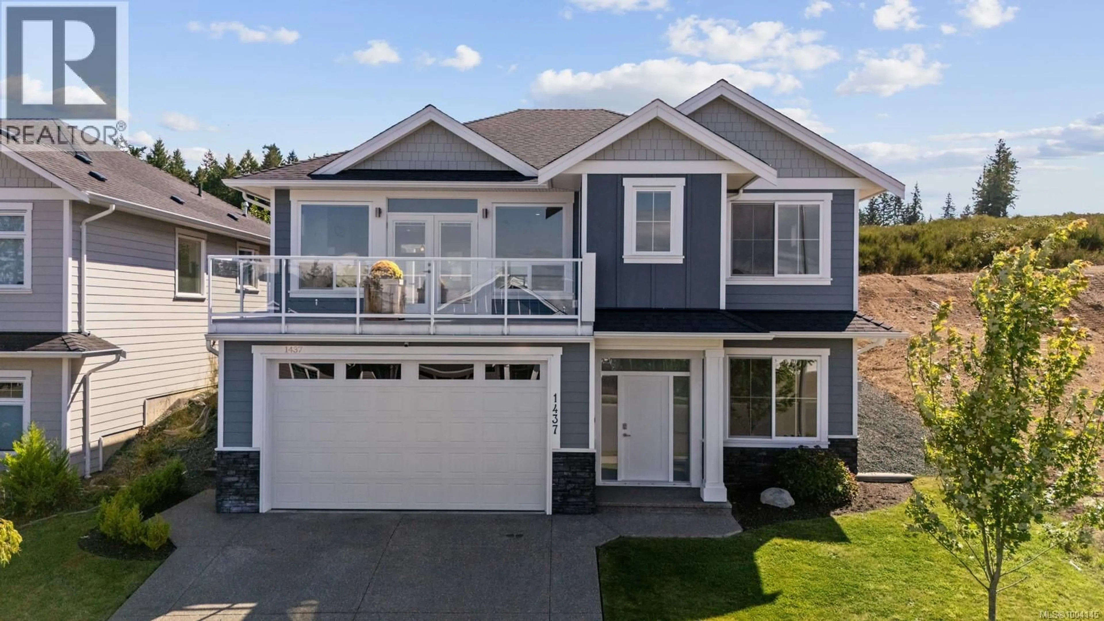 Home with vinyl exterior material, street for 1437 CROWN ISLE BOULEVARD, Courtenay British Columbia V9N0G3