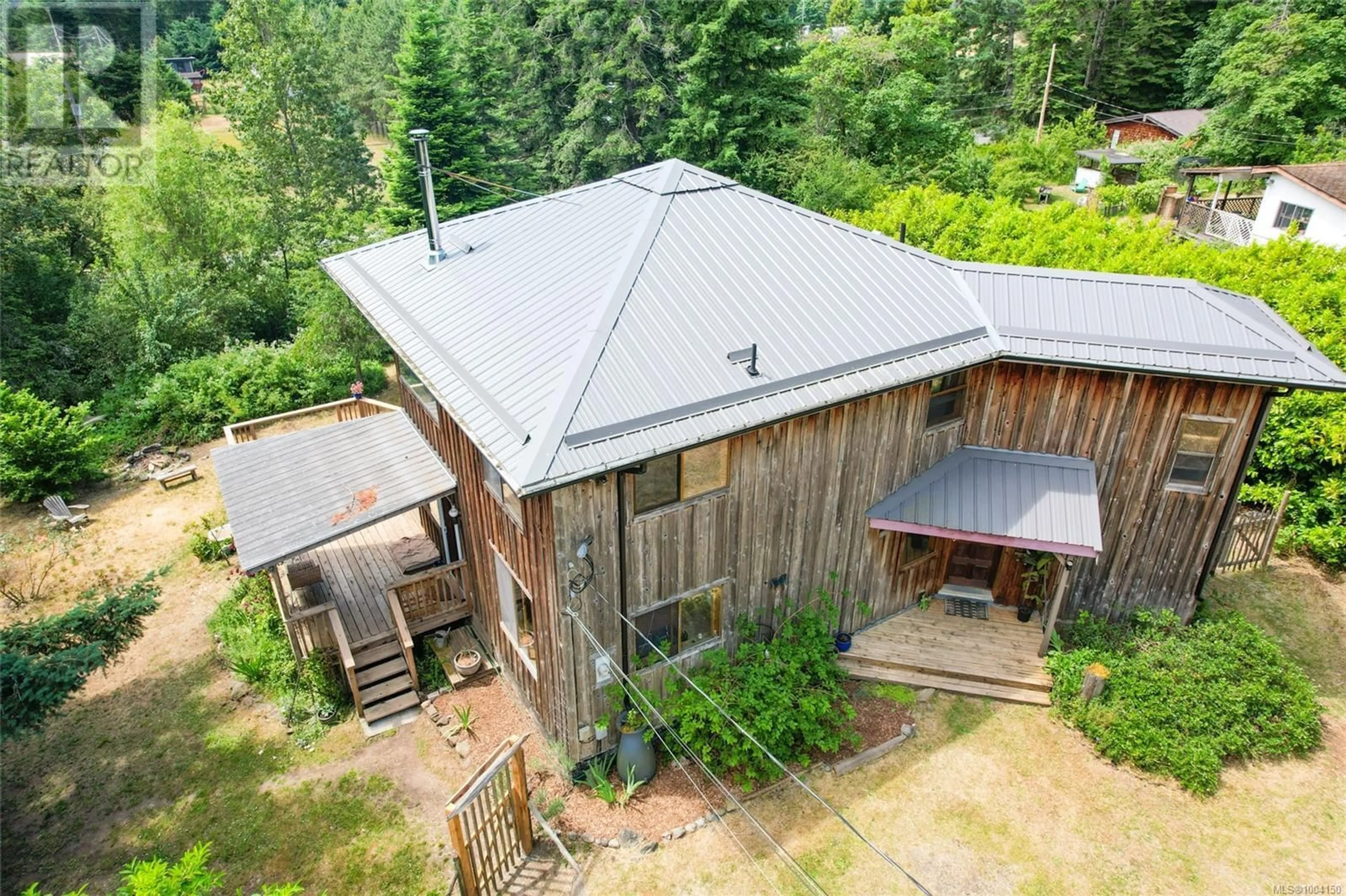 A pic from outside/outdoor area/front of a property/back of a property/a pic from drone, building for 1915 STOKES ROAD, Gabriola Island British Columbia V0R1X7