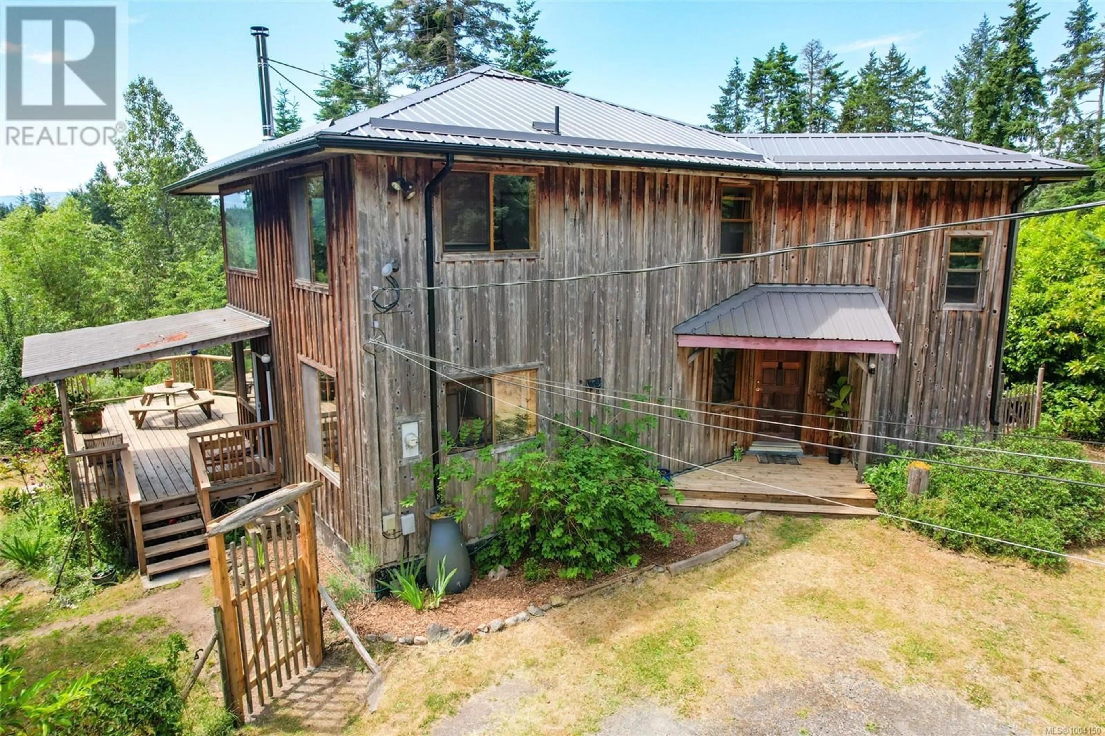 A pic from outside/outdoor area/front of a property/back of a property/a pic from drone, building for 1915 STOKES ROAD, Gabriola Island British Columbia V0R1X7