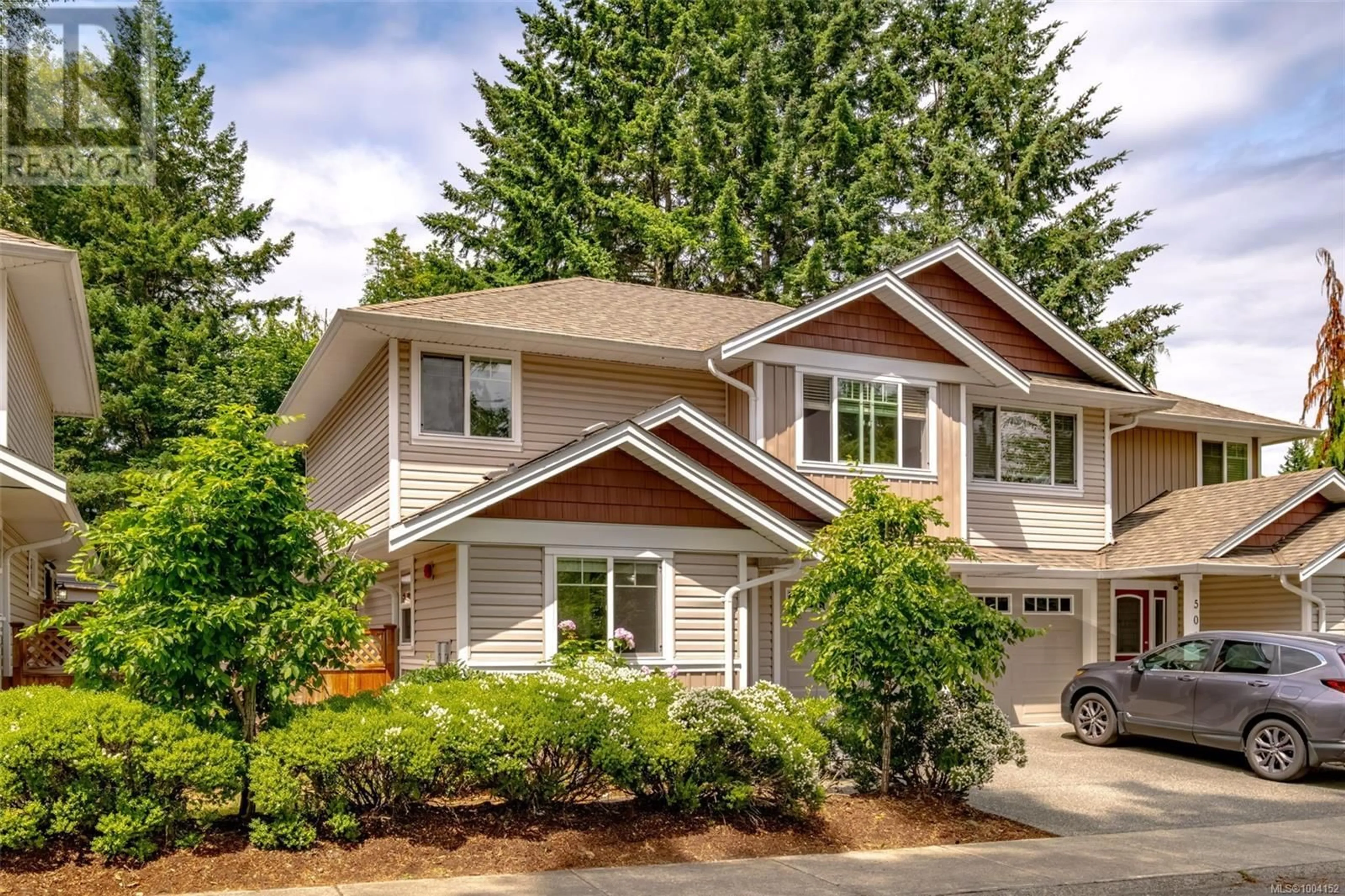 Home with vinyl exterior material, street for 504 GARDASAN WAY, Nanaimo British Columbia V9R6K8