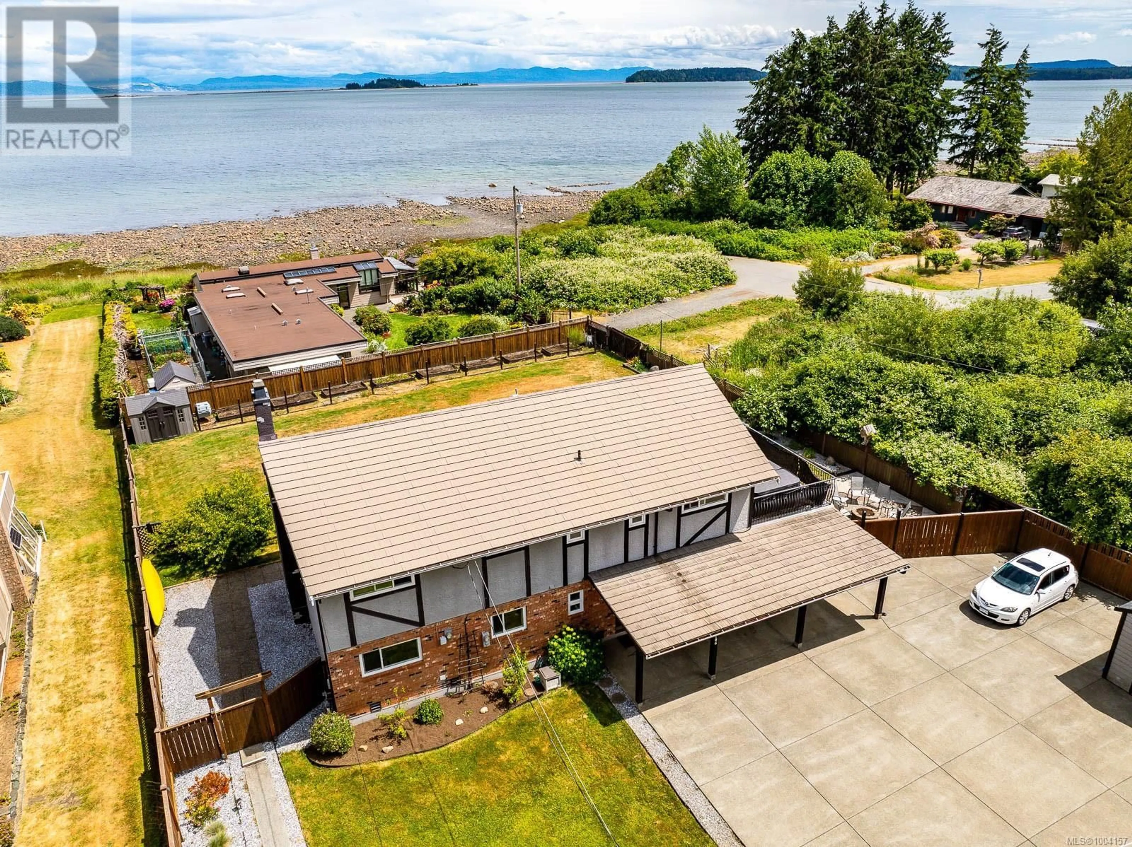 A pic from outside/outdoor area/front of a property/back of a property/a pic from drone, water/lake/river/ocean view for 4786 KILMARNOCK DRIVE, Courtenay British Columbia V9N9S5