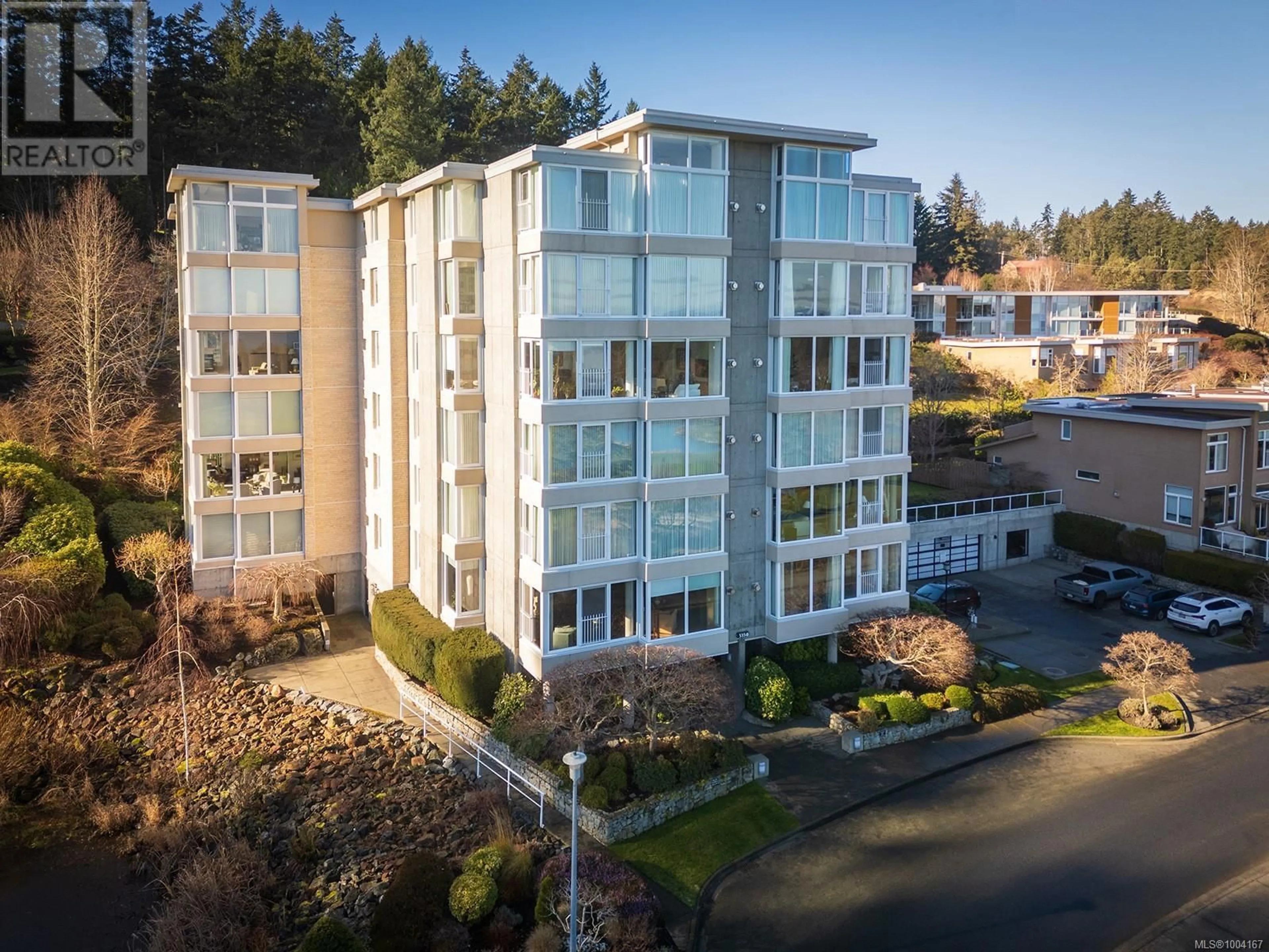 A pic from outside/outdoor area/front of a property/back of a property/a pic from drone, building for 101 - 5350 SAYWARD HILL CRESCENT, Saanich British Columbia V8Y3H9