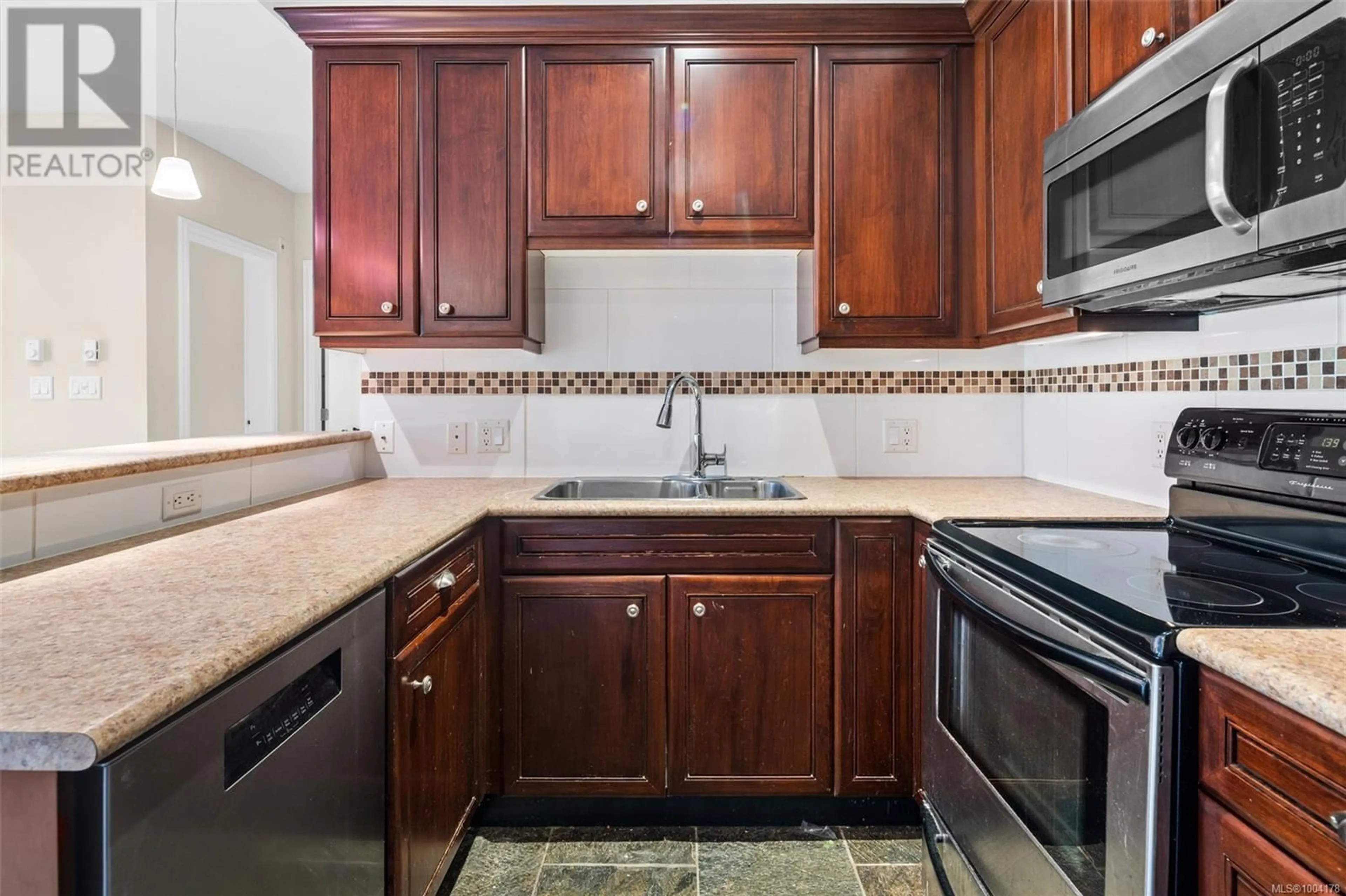 Standard kitchen, ceramic/tile floor for 311 - 1335 BEAR MOUNTAIN PARKWAY, Langford British Columbia V9B6T9