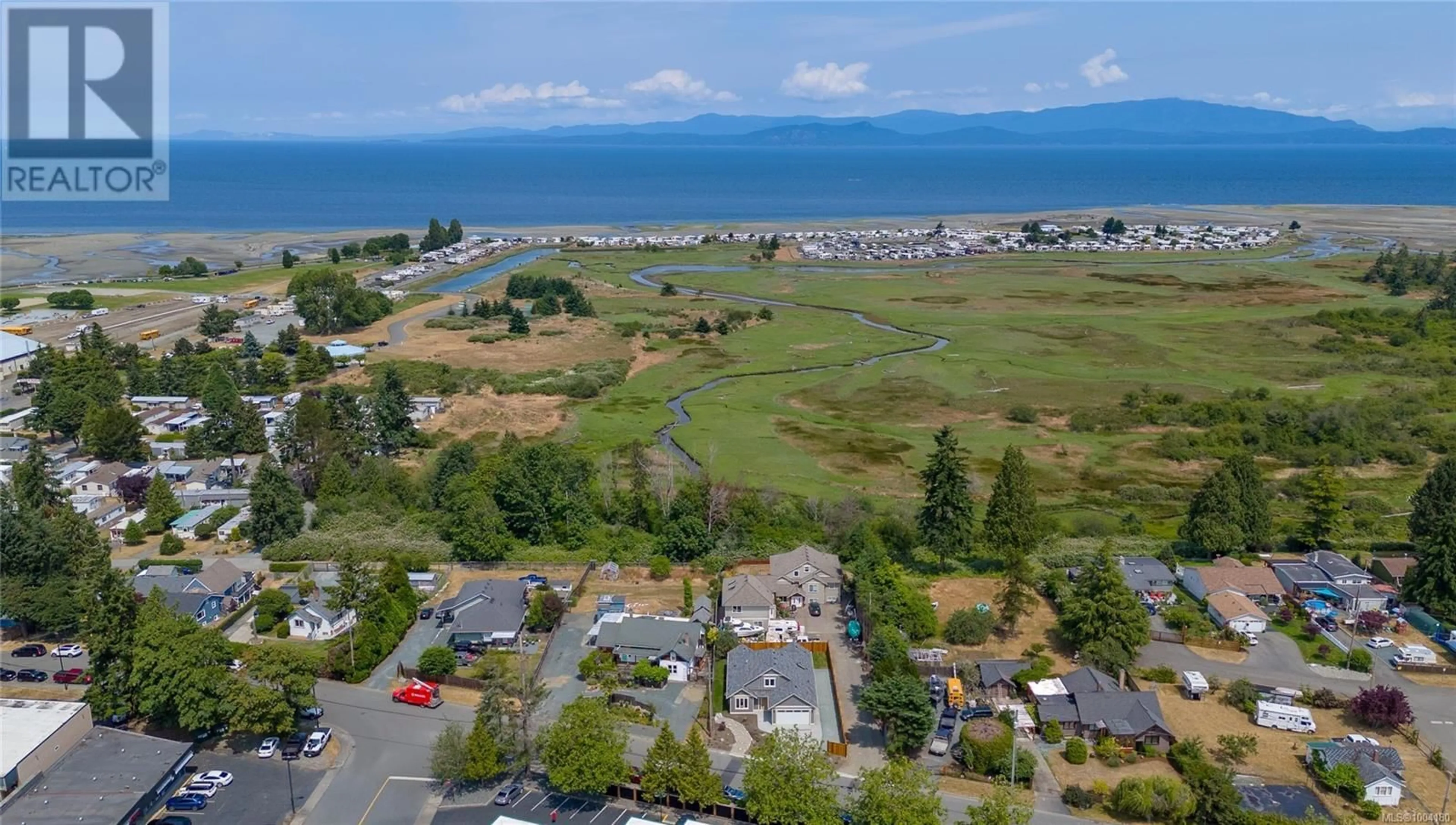 A pic from outside/outdoor area/front of a property/back of a property/a pic from drone, water/lake/river/ocean view for 317 PIONEER CRESCENT, Parksville British Columbia V9P1V5