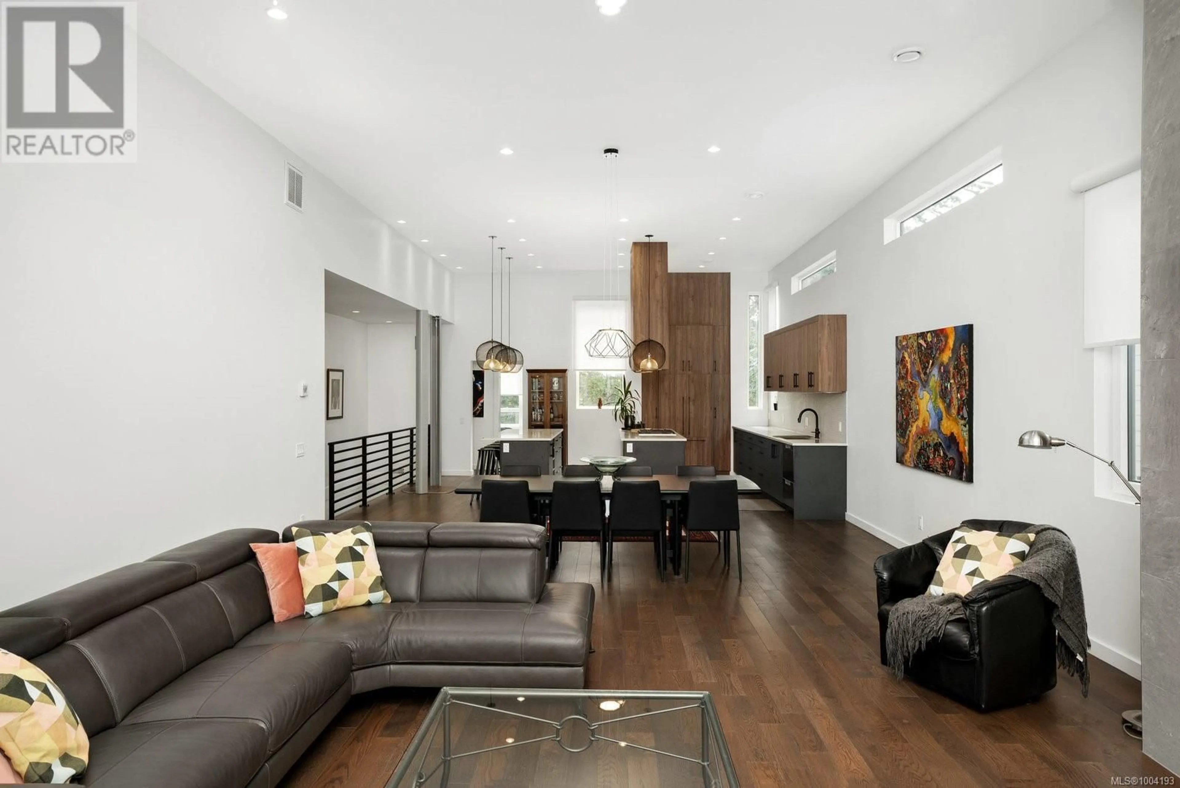 Living room with furniture, wood/laminate floor for 3508 WISHART ROAD, Colwood British Columbia V9C3B1