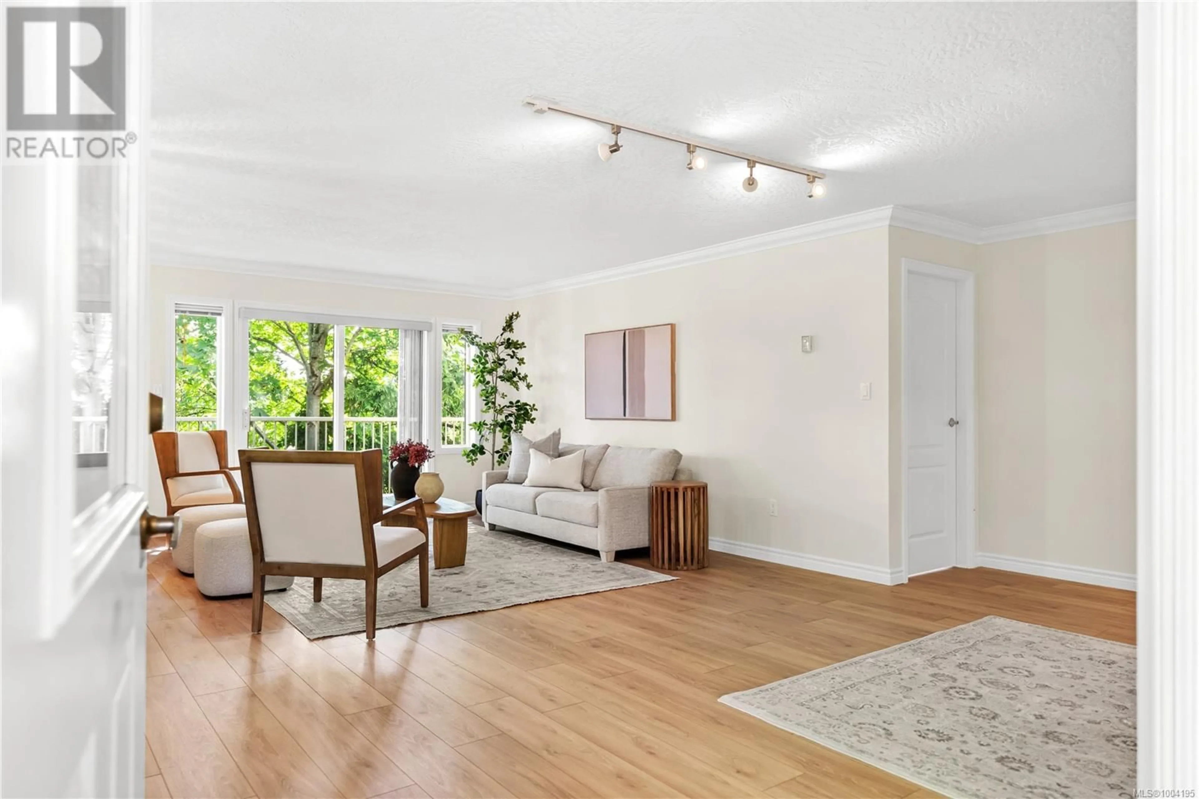 Living room with furniture, wood/laminate floor for 16 - 106 ALDERSMITH PLACE, View Royal British Columbia V9A7M8