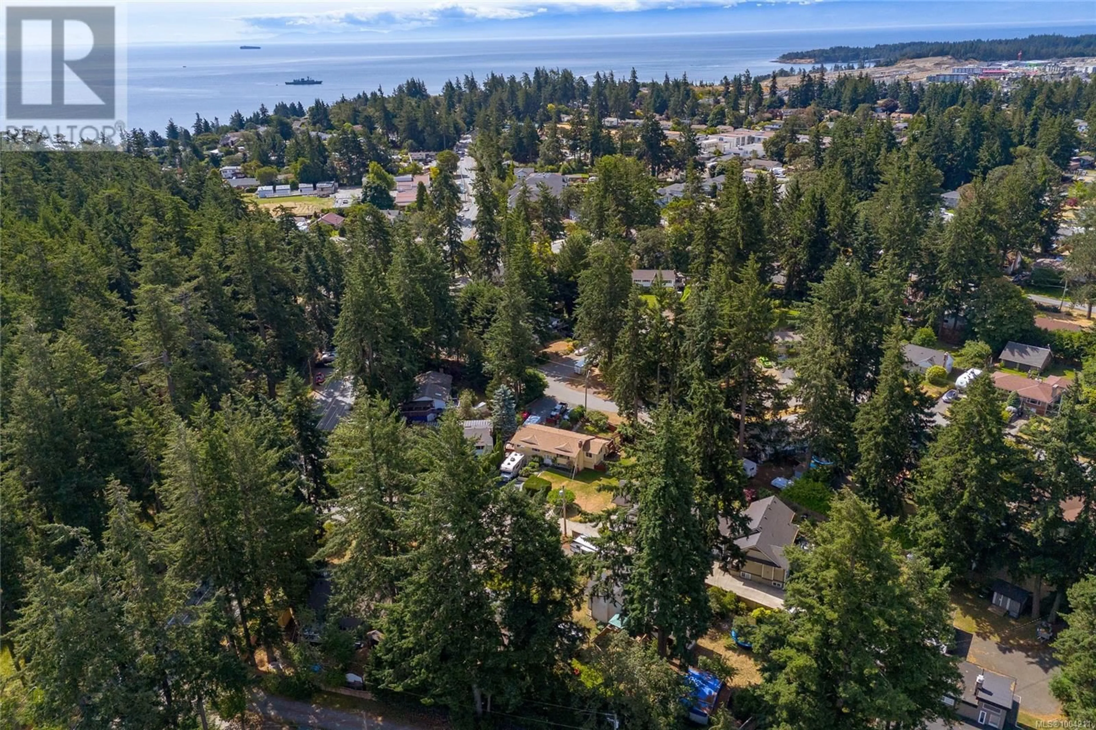 A pic from outside/outdoor area/front of a property/back of a property/a pic from drone, unknown for 409 RAYNERWOOD PLACE, Colwood British Columbia V9C2B4