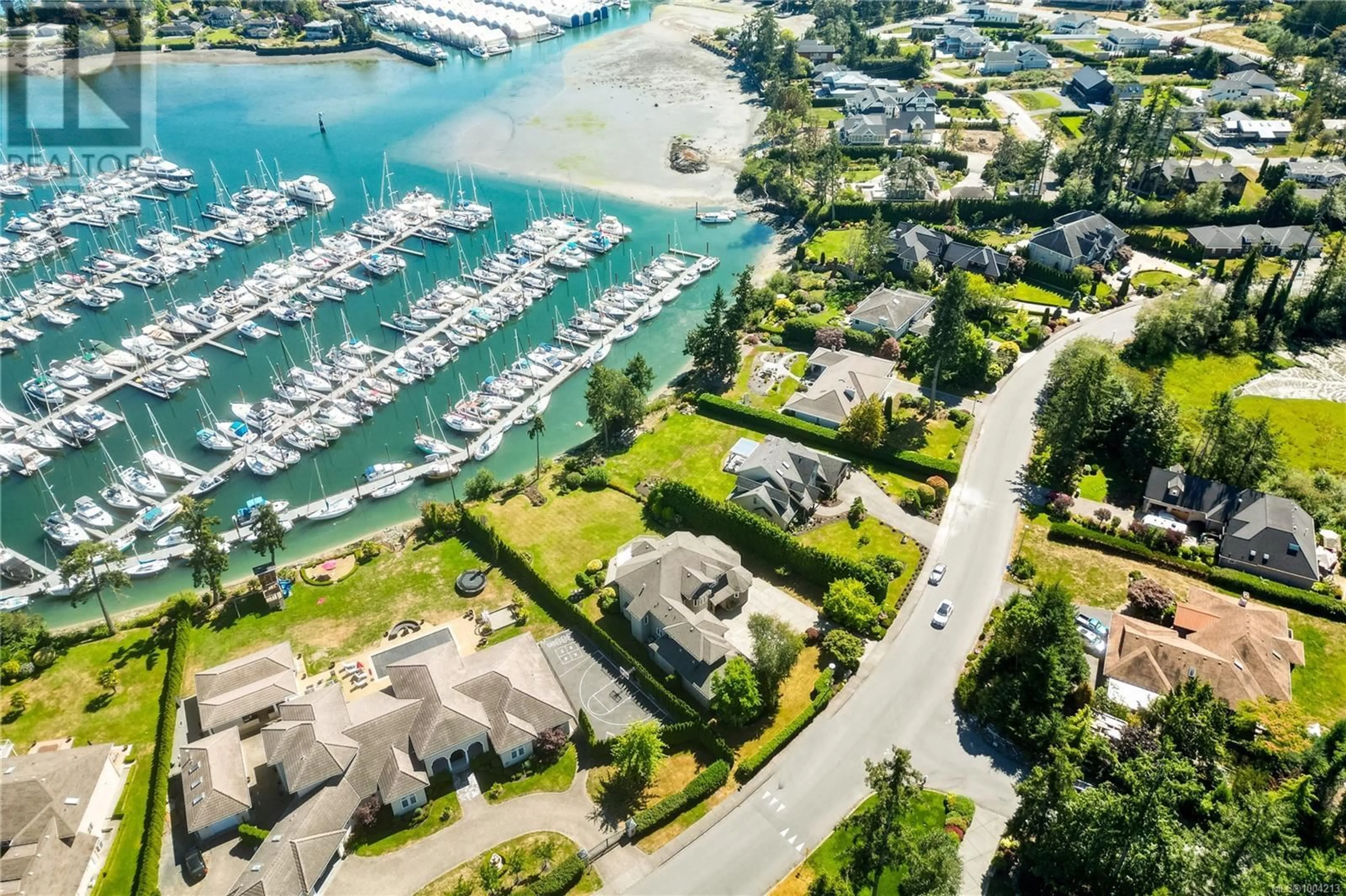 A pic from outside/outdoor area/front of a property/back of a property/a pic from drone, water/lake/river/ocean view for 1867 MARINA WAY, North Saanich British Columbia V8L6B3