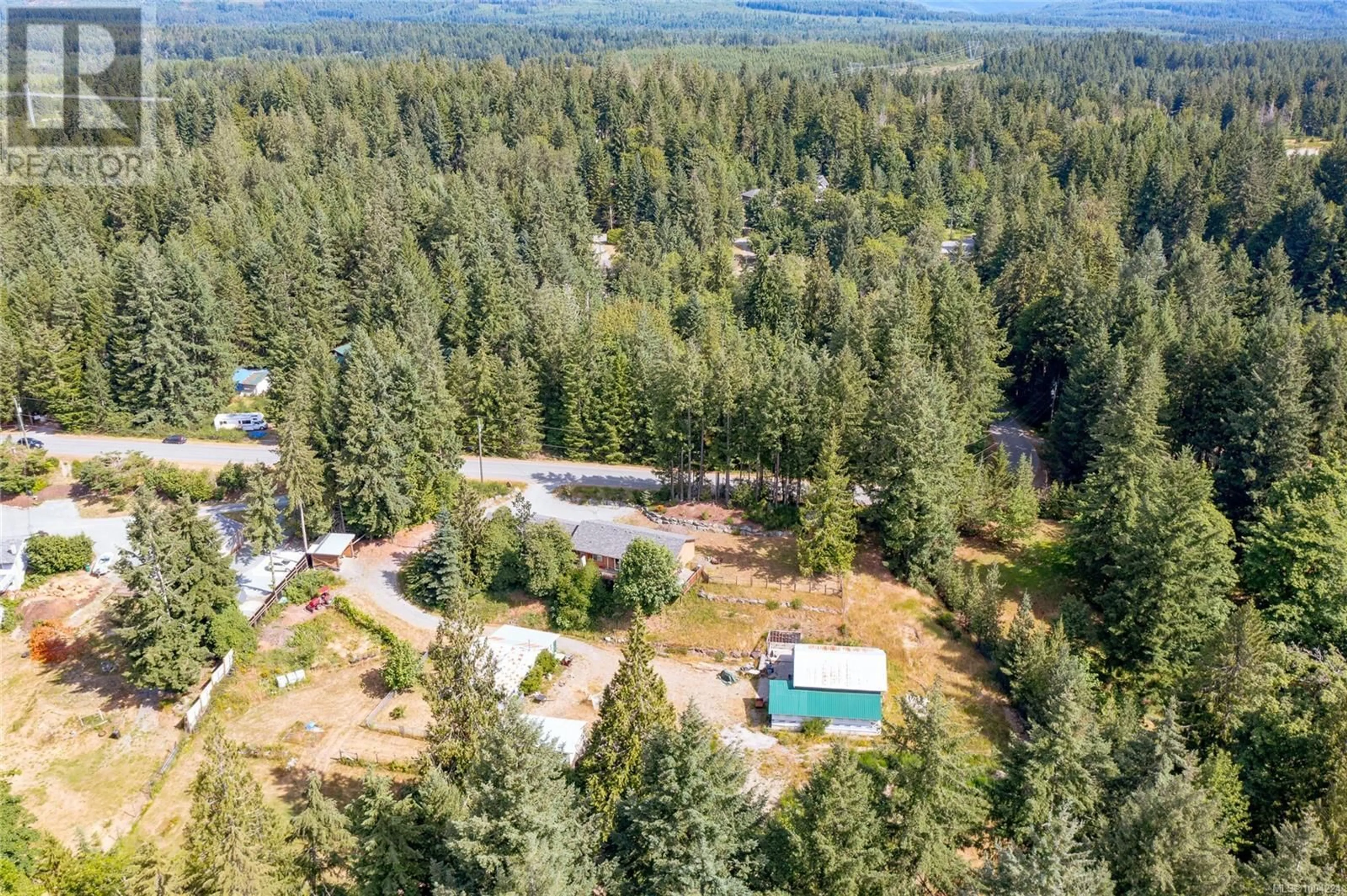 A pic from outside/outdoor area/front of a property/back of a property/a pic from drone, forest/trees view for 5036 CULVERTON ROAD, Duncan British Columbia V9L6H4