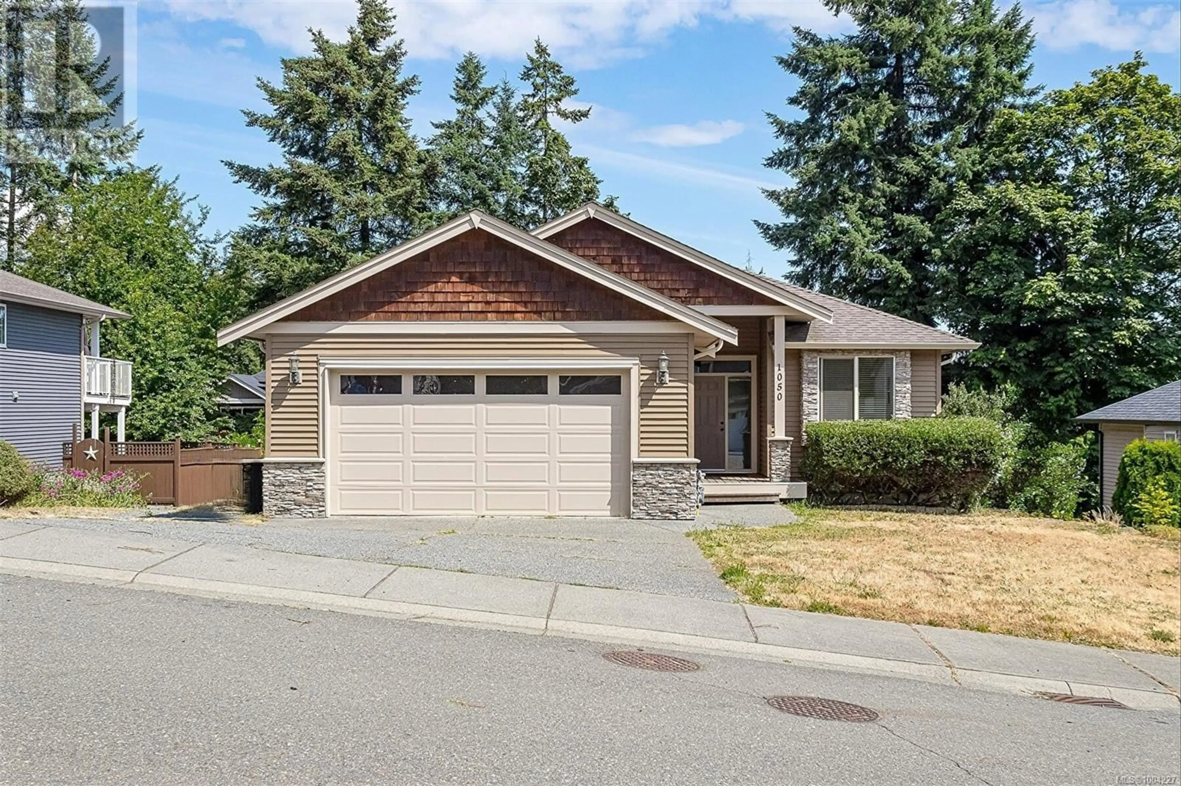 Home with vinyl exterior material, street for 1050 SOUTHWOOD DRIVE, Nanaimo British Columbia V9R0B2