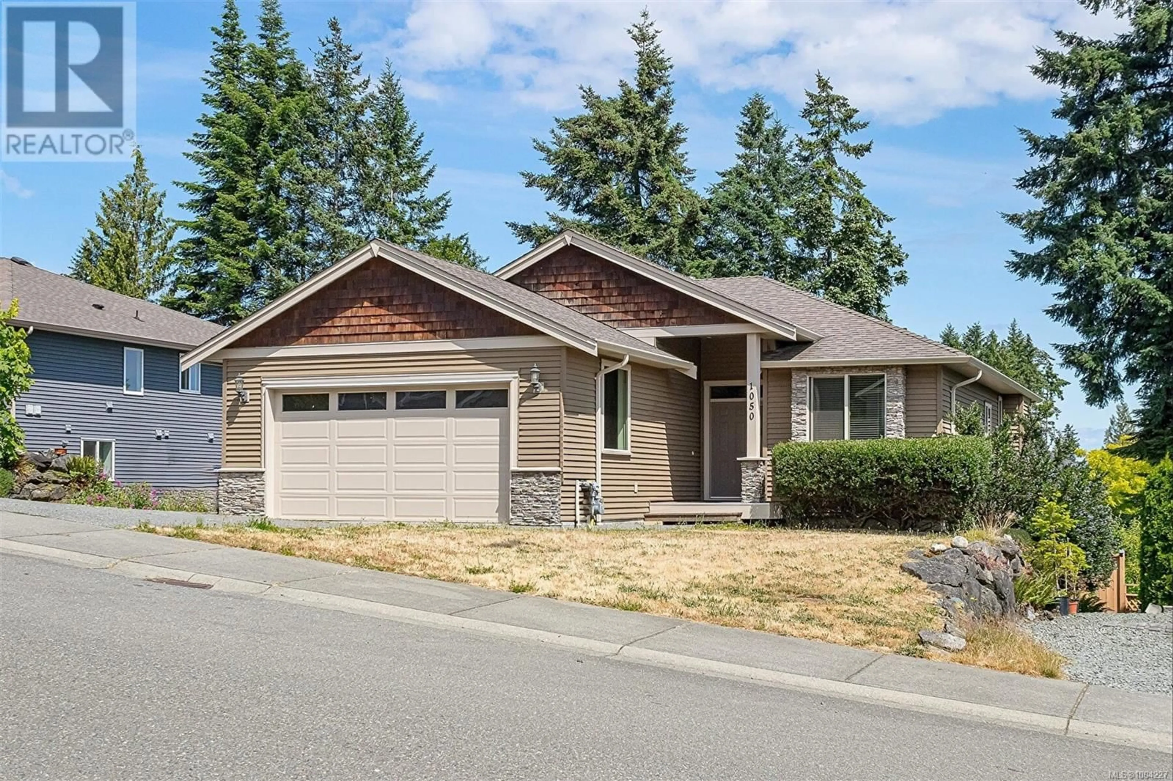 Home with vinyl exterior material, street for 1050 SOUTHWOOD DRIVE, Nanaimo British Columbia V9R0B2