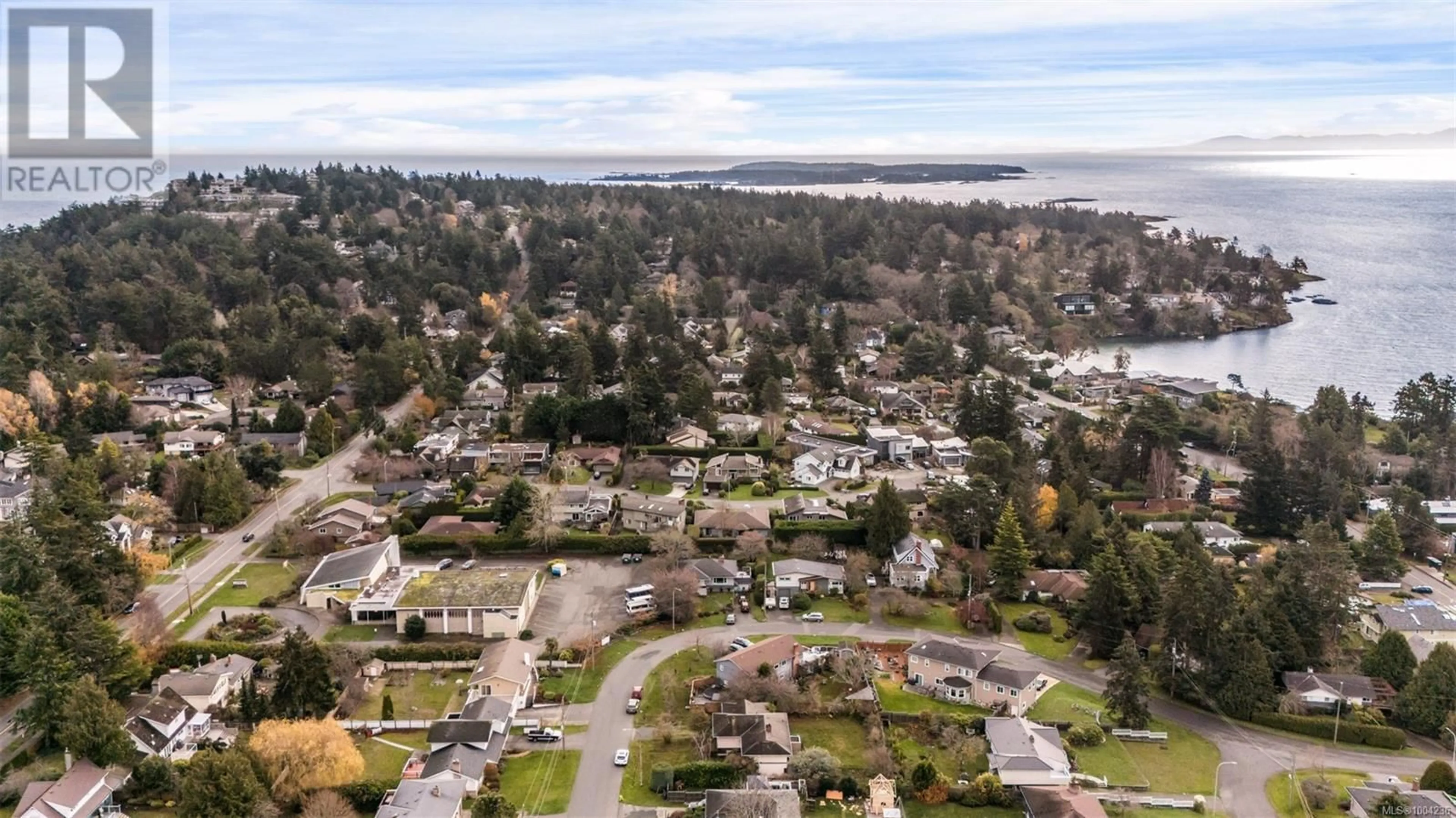 A pic from outside/outdoor area/front of a property/back of a property/a pic from drone, unknown for 3950 CHERRILEE CRESCENT, Saanich British Columbia V8N1R9