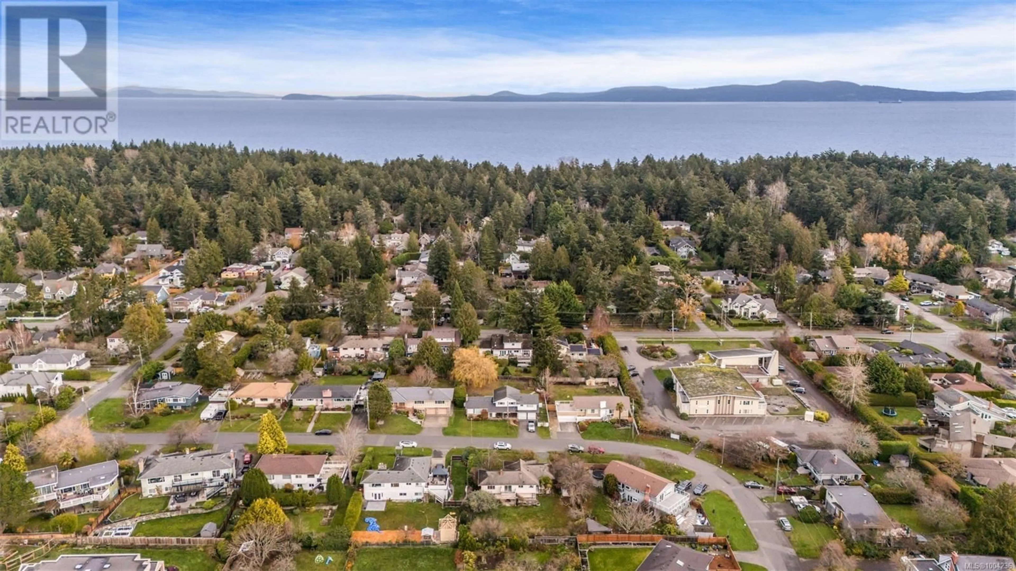 A pic from outside/outdoor area/front of a property/back of a property/a pic from drone, water/lake/river/ocean view for 3950 CHERRILEE CRESCENT, Saanich British Columbia V8N1R9