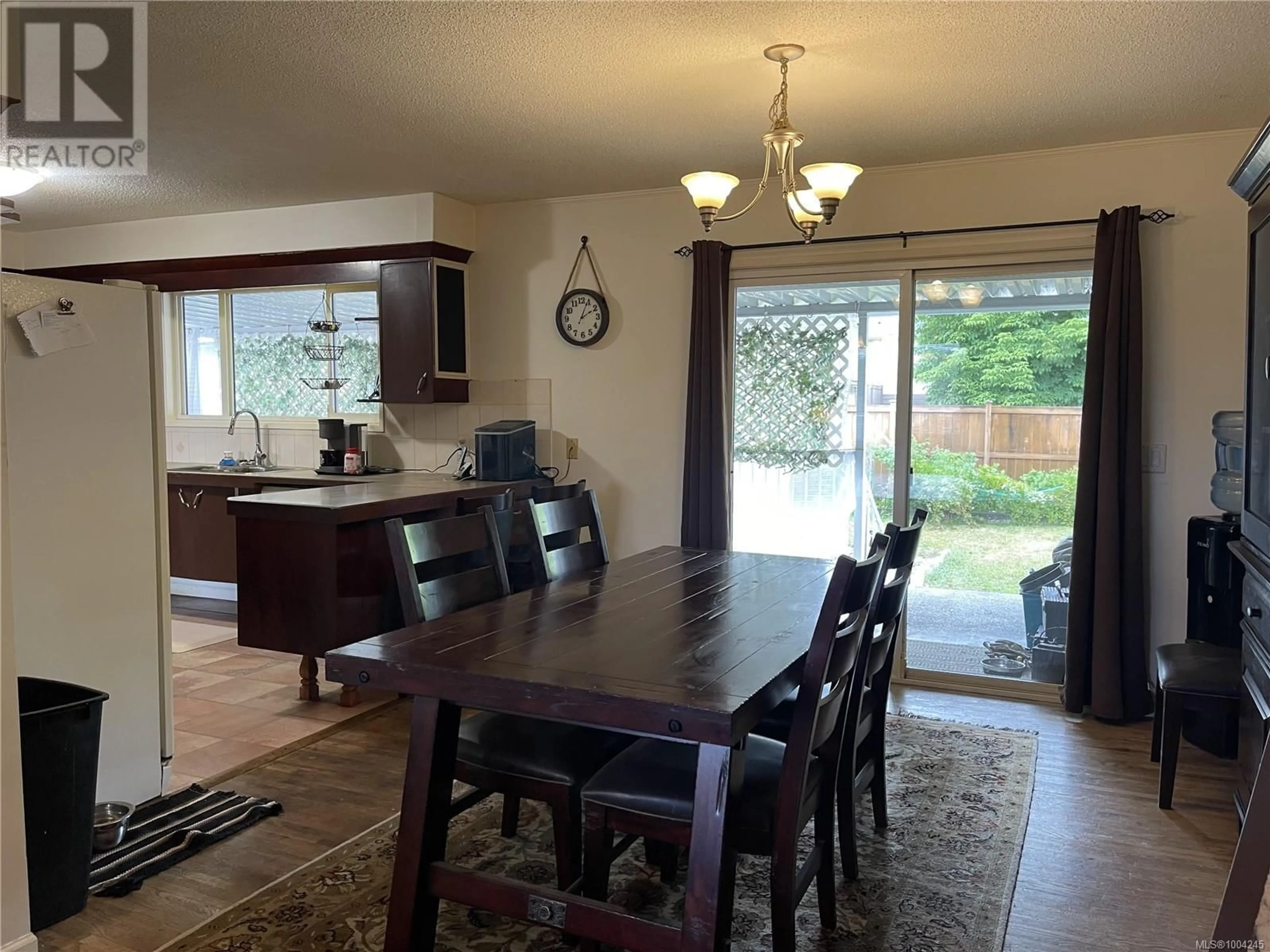 Dining room, wood/laminate floor for 2619 12TH AVENUE, Port Alberni British Columbia V9Y2T8