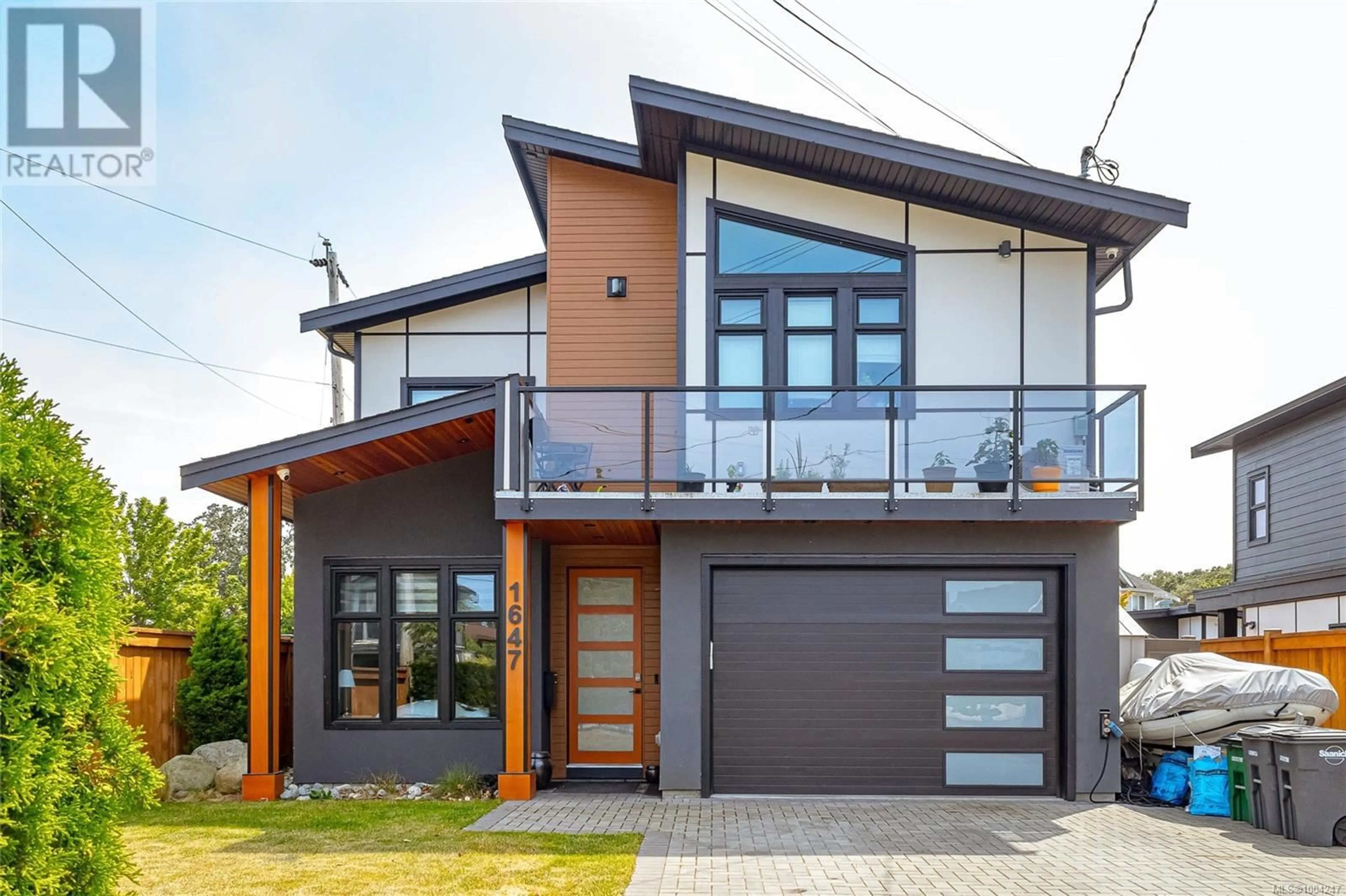 Home with brick exterior material, street for 1647 KENMORE ROAD, Saanich British Columbia V8N4M8