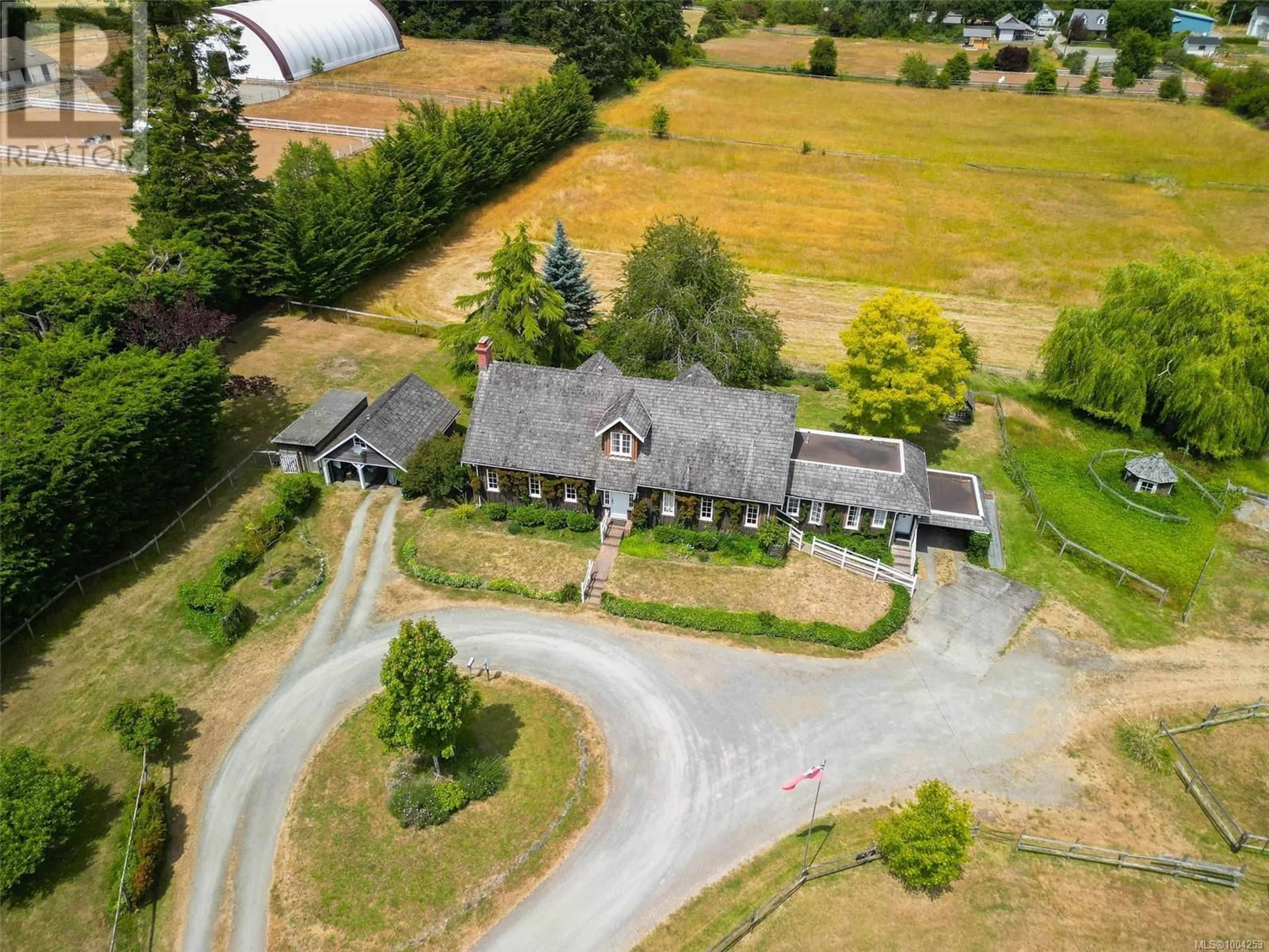 A pic from outside/outdoor area/front of a property/back of a property/a pic from drone, mountain view for 1600 WHITE ROAD, Central Saanich British Columbia V8M1S8
