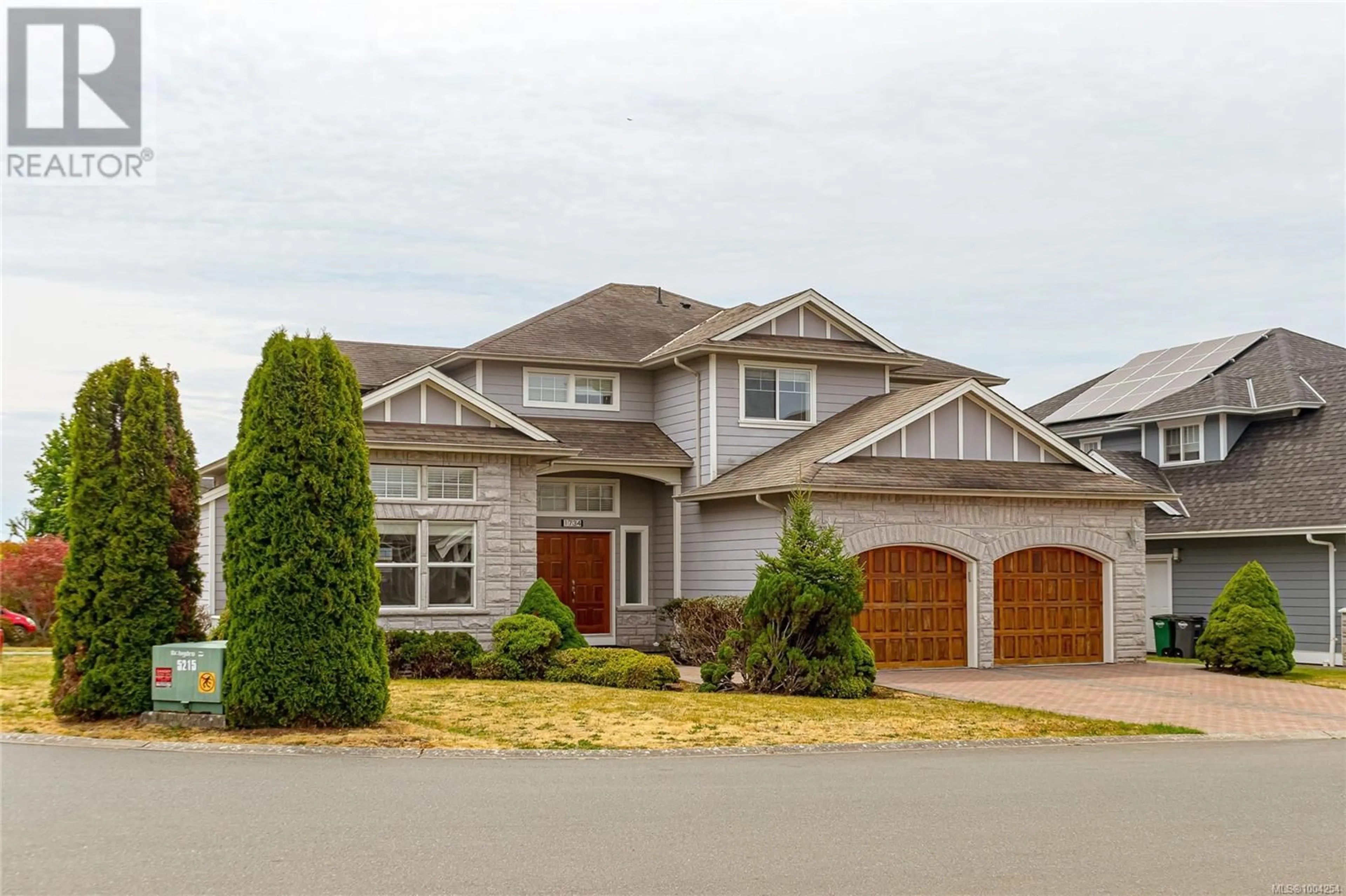 Home with vinyl exterior material, street for 1734 MAMICH CIRCLE, Saanich British Columbia V8N6N1