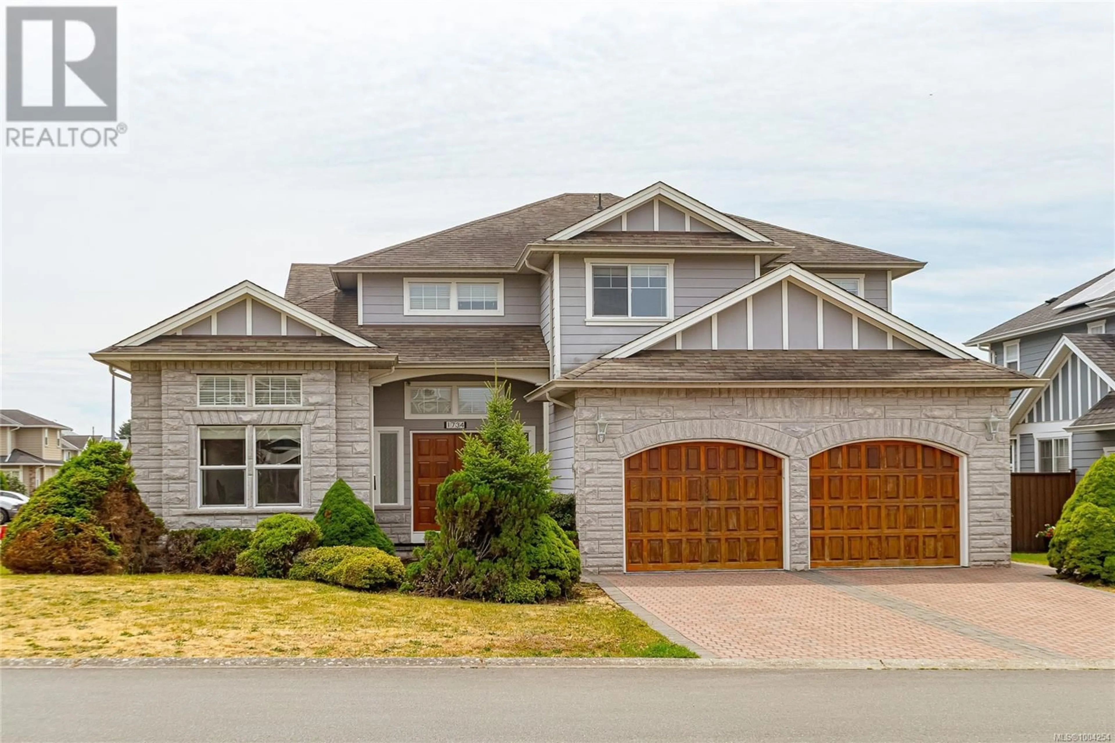 Home with vinyl exterior material, street for 1734 MAMICH CIRCLE, Saanich British Columbia V8N6N1