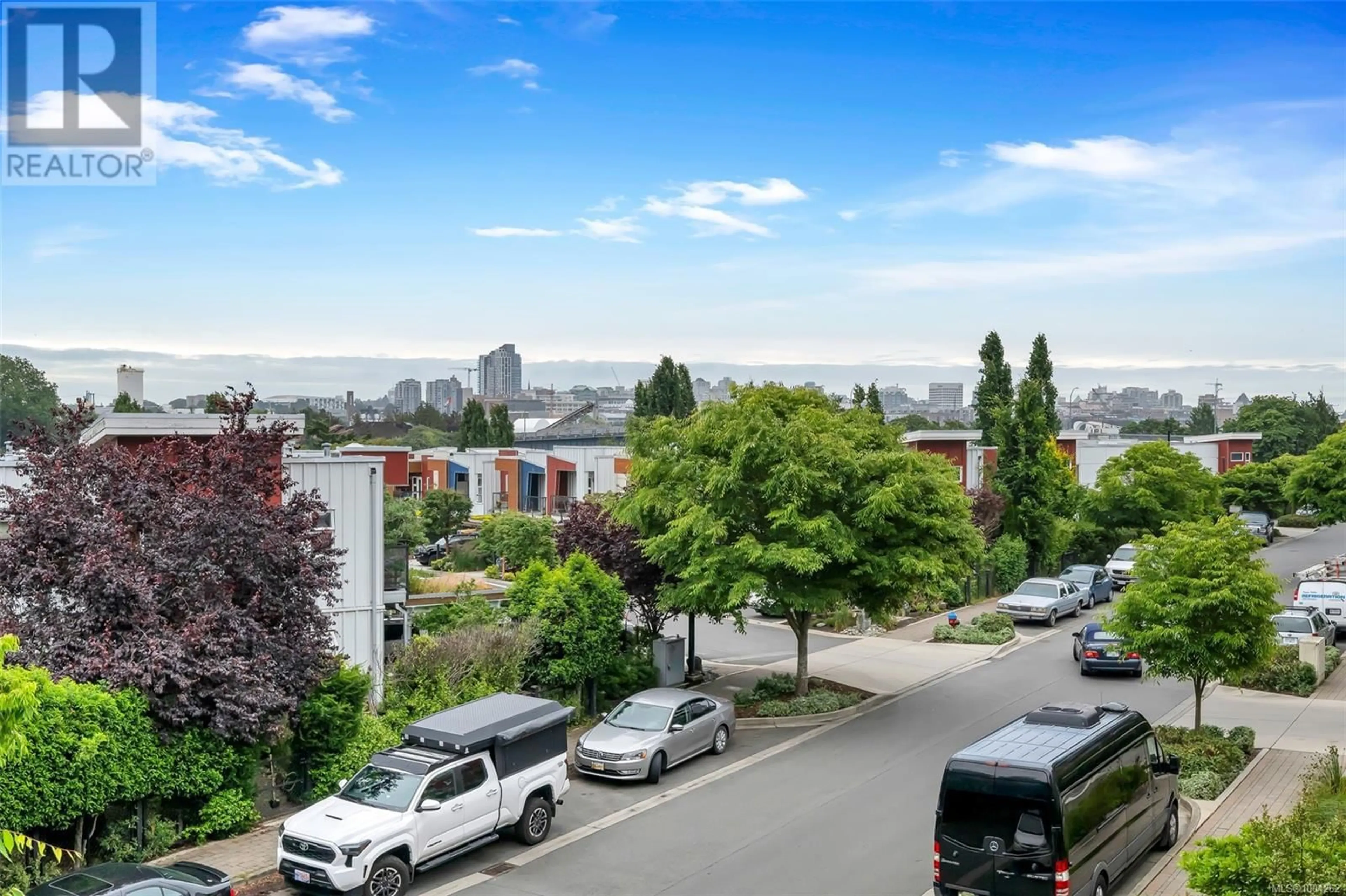 A pic from outside/outdoor area/front of a property/back of a property/a pic from drone, city buildings view from balcony for 208 - 787 TYEE ROAD, Victoria British Columbia V9A7R5