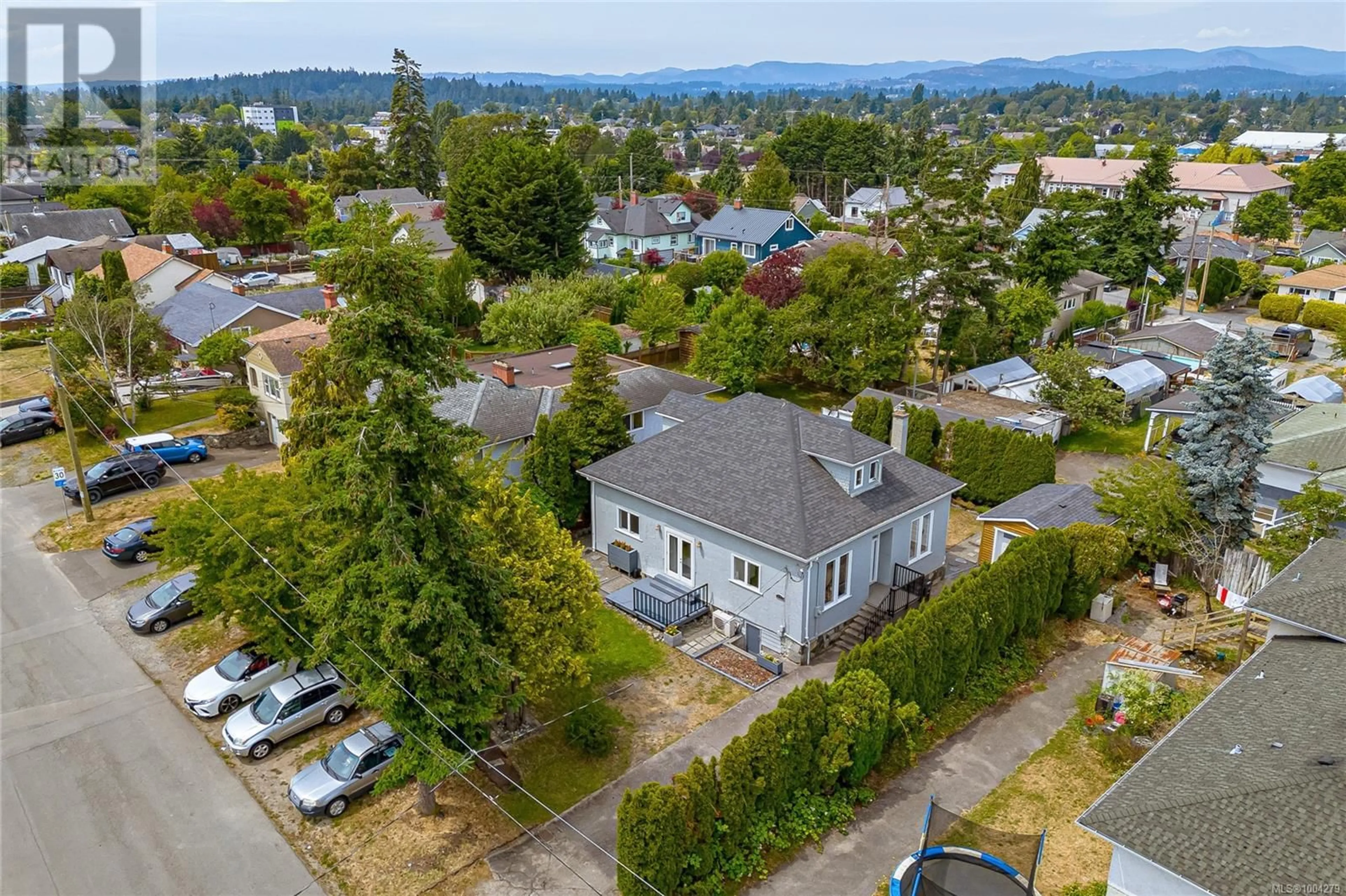 A pic from outside/outdoor area/front of a property/back of a property/a pic from drone, unknown for 3184 MILLGROVE STREET, Saanich British Columbia V9A1X6