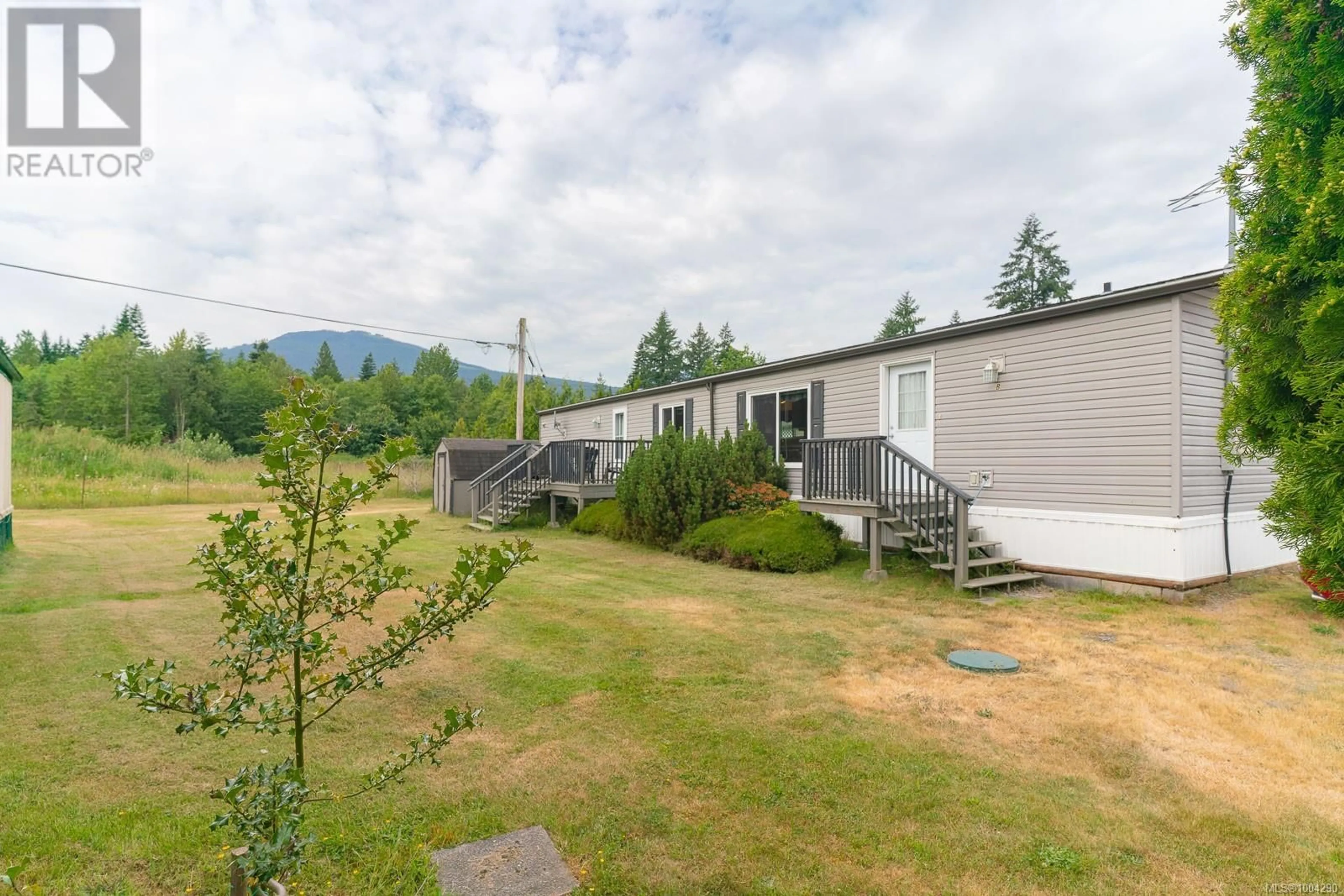 A pic from outside/outdoor area/front of a property/back of a property/a pic from drone, mountain view for B - 10860 CHEMAINUS ROAD, Saltair British Columbia V9G2A5
