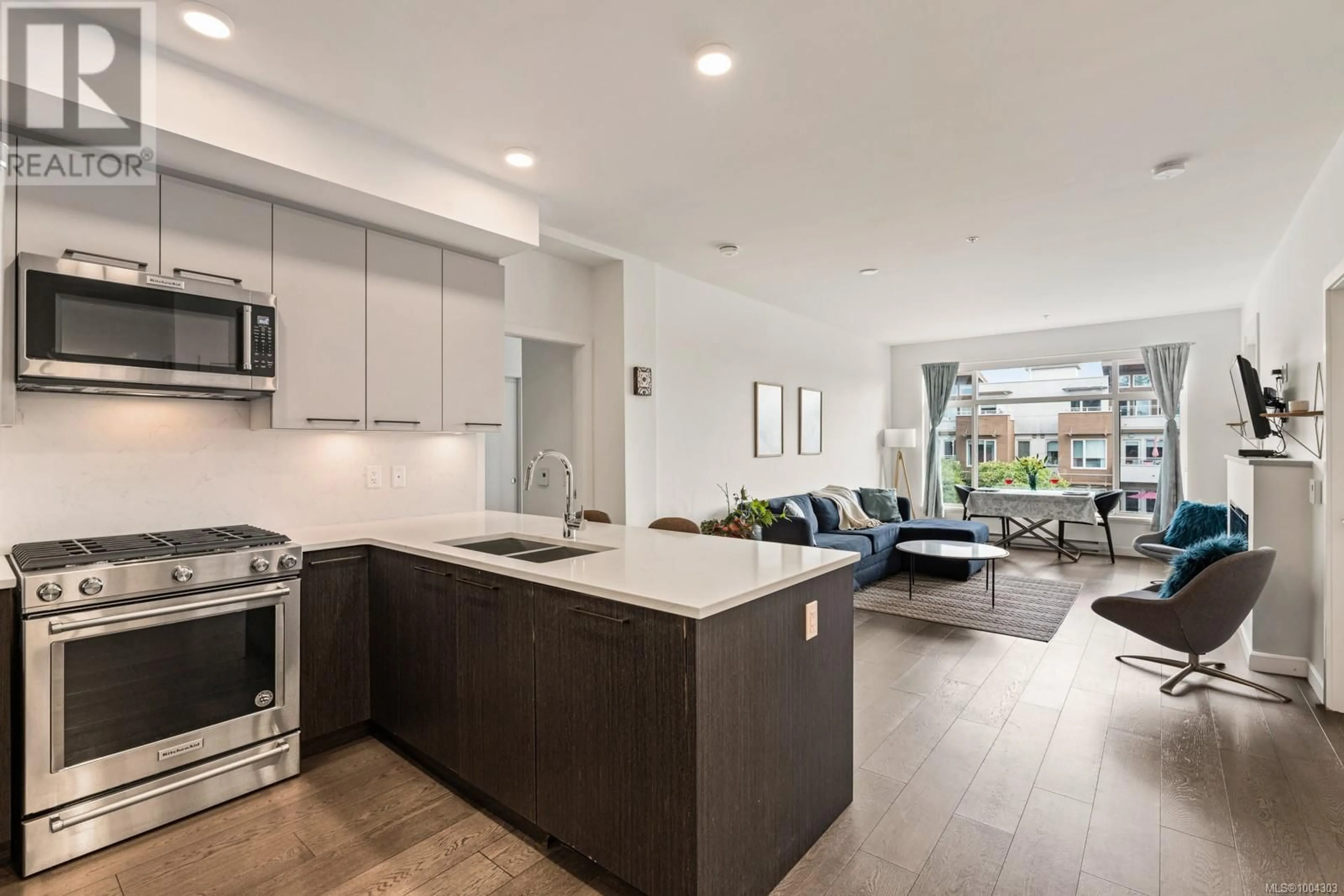 Open concept kitchen, ceramic/tile floor for 403 - 7162 WEST SAANICH ROAD, Central Saanich British Columbia V8M1P6