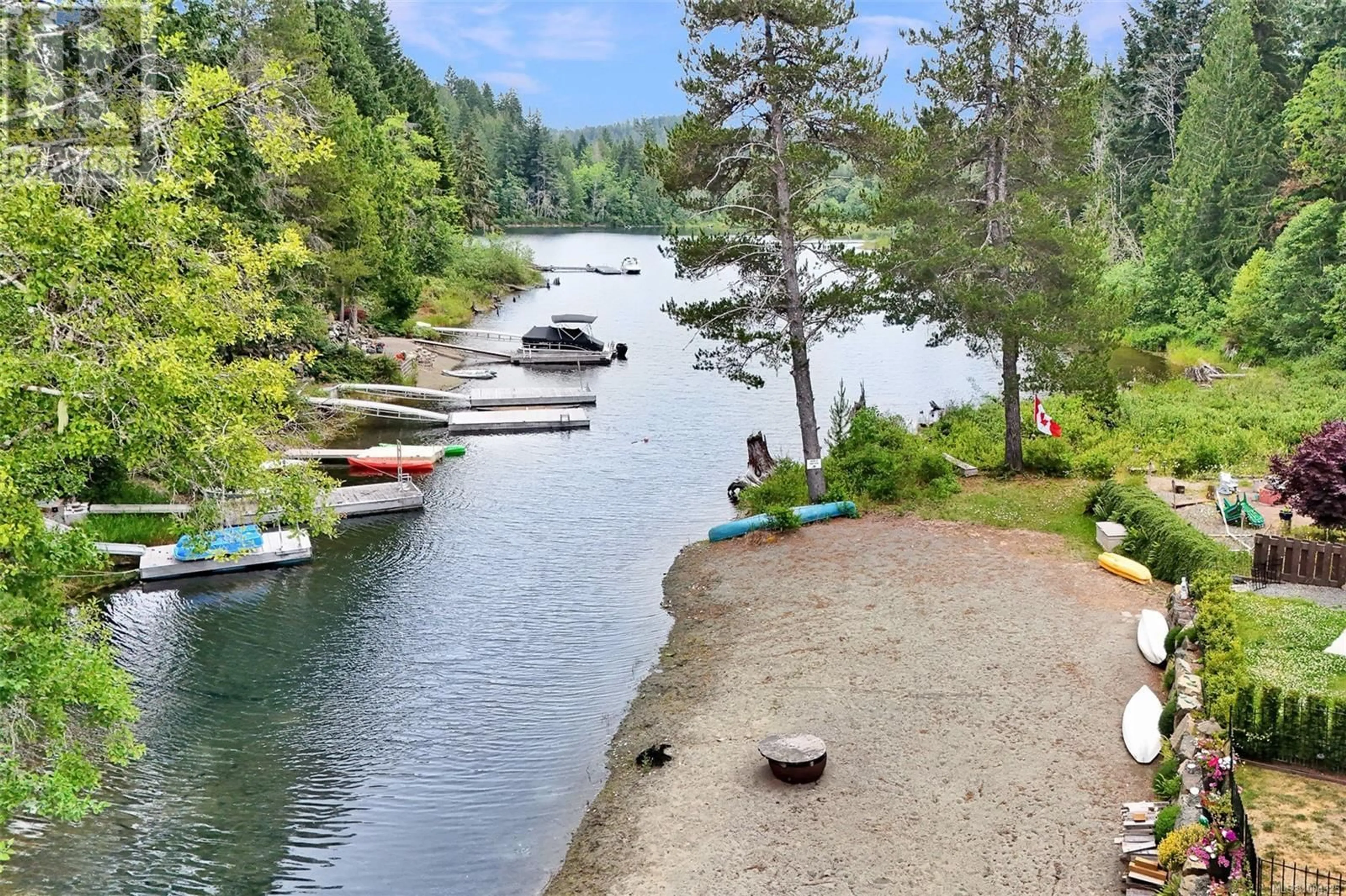 A pic from outside/outdoor area/front of a property/back of a property/a pic from drone, water/lake/river/ocean view for 32 - 10750 CENTRAL LAKE ROAD, Port Alberni British Columbia V9Y8Z2