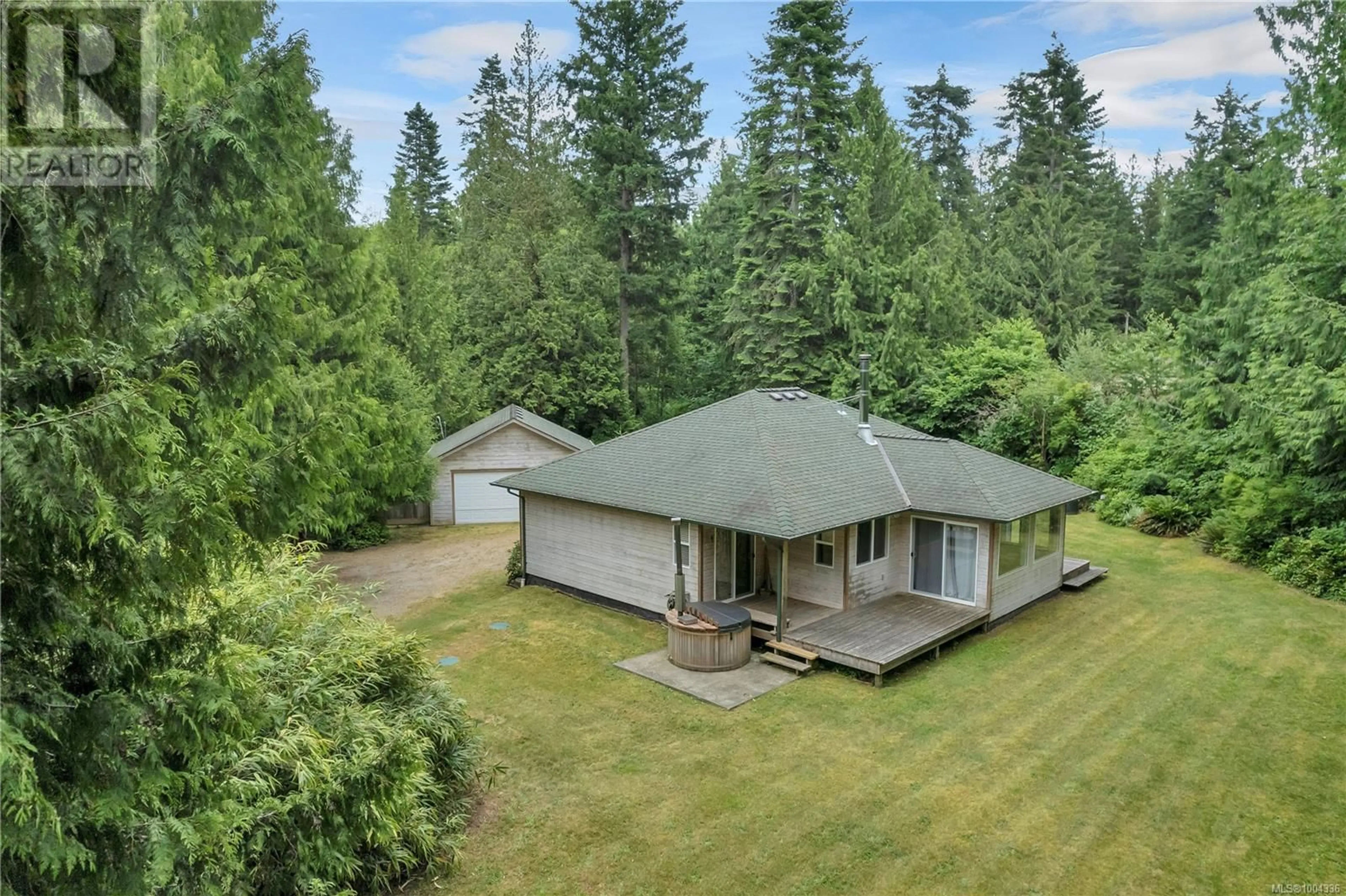 A pic from outside/outdoor area/front of a property/back of a property/a pic from drone, forest/trees view for 1531 SCHOONER ROAD, Quadra Island British Columbia V0P1H0