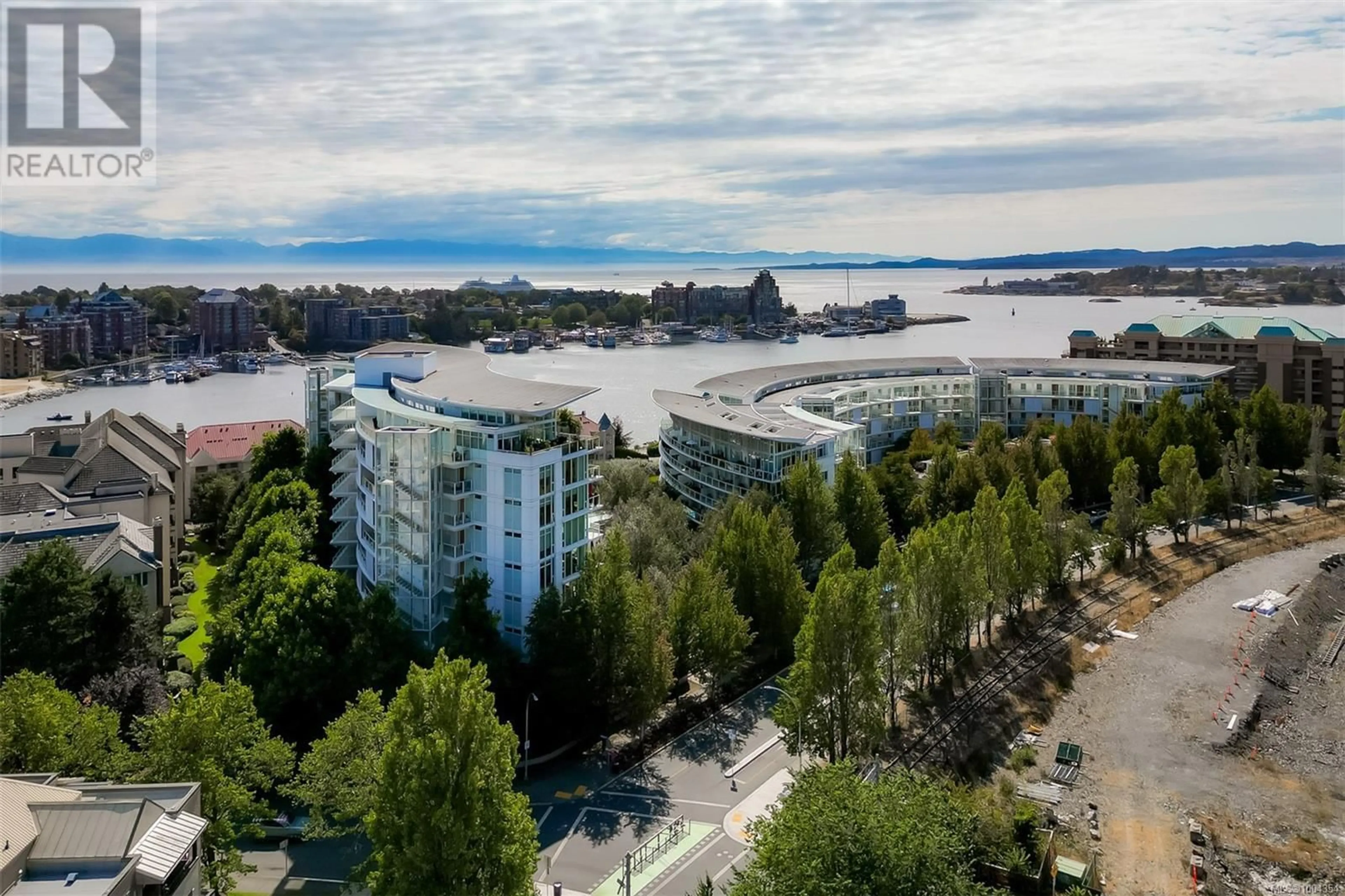 A pic from outside/outdoor area/front of a property/back of a property/a pic from drone, water/lake/river/ocean view for 107 - 68 SONGHEES ROAD, Victoria British Columbia V9A0A3