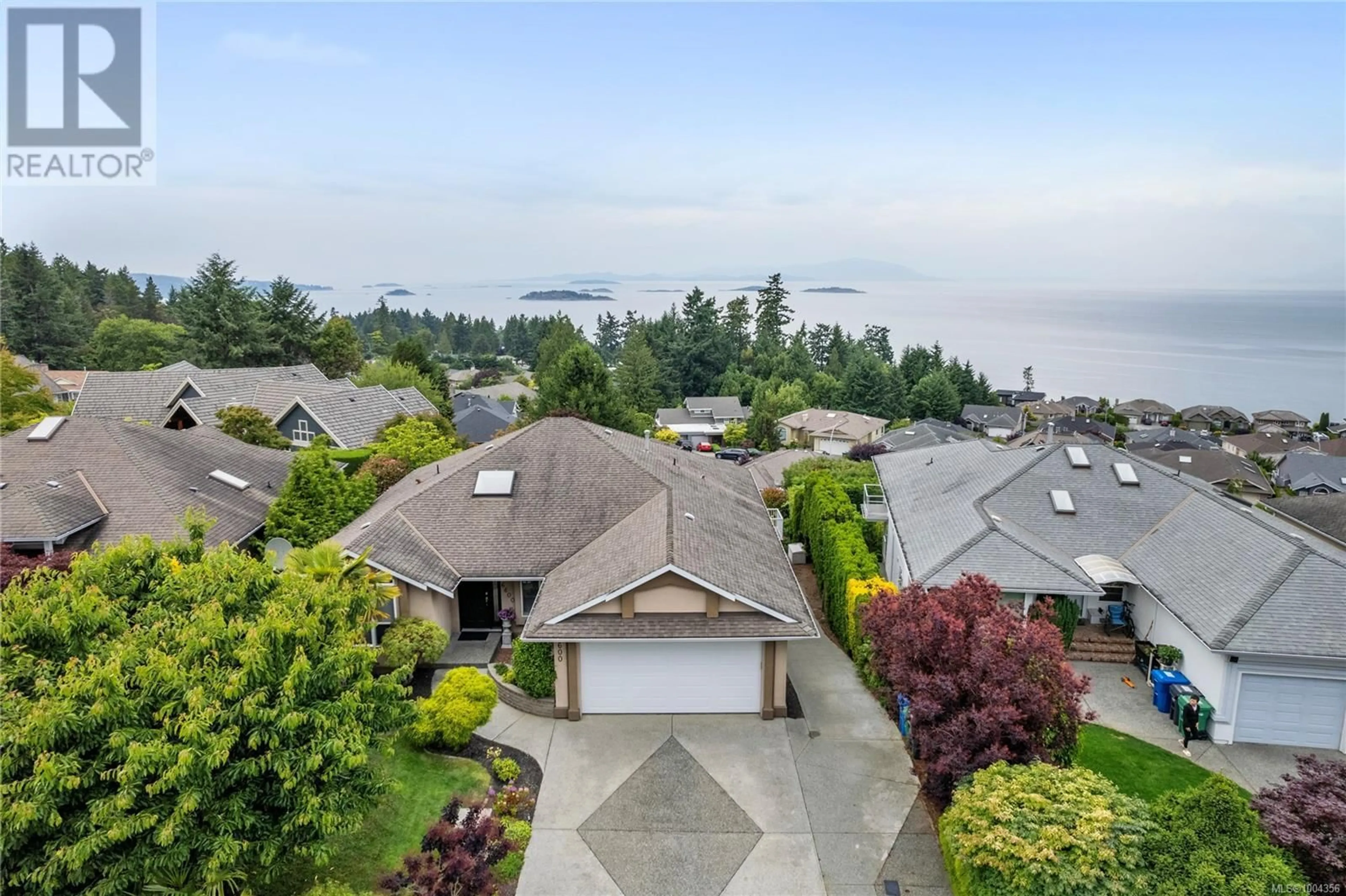 A pic from outside/outdoor area/front of a property/back of a property/a pic from drone, water/lake/river/ocean view for 6600 GROVELAND DRIVE, Nanaimo British Columbia V9V1P7