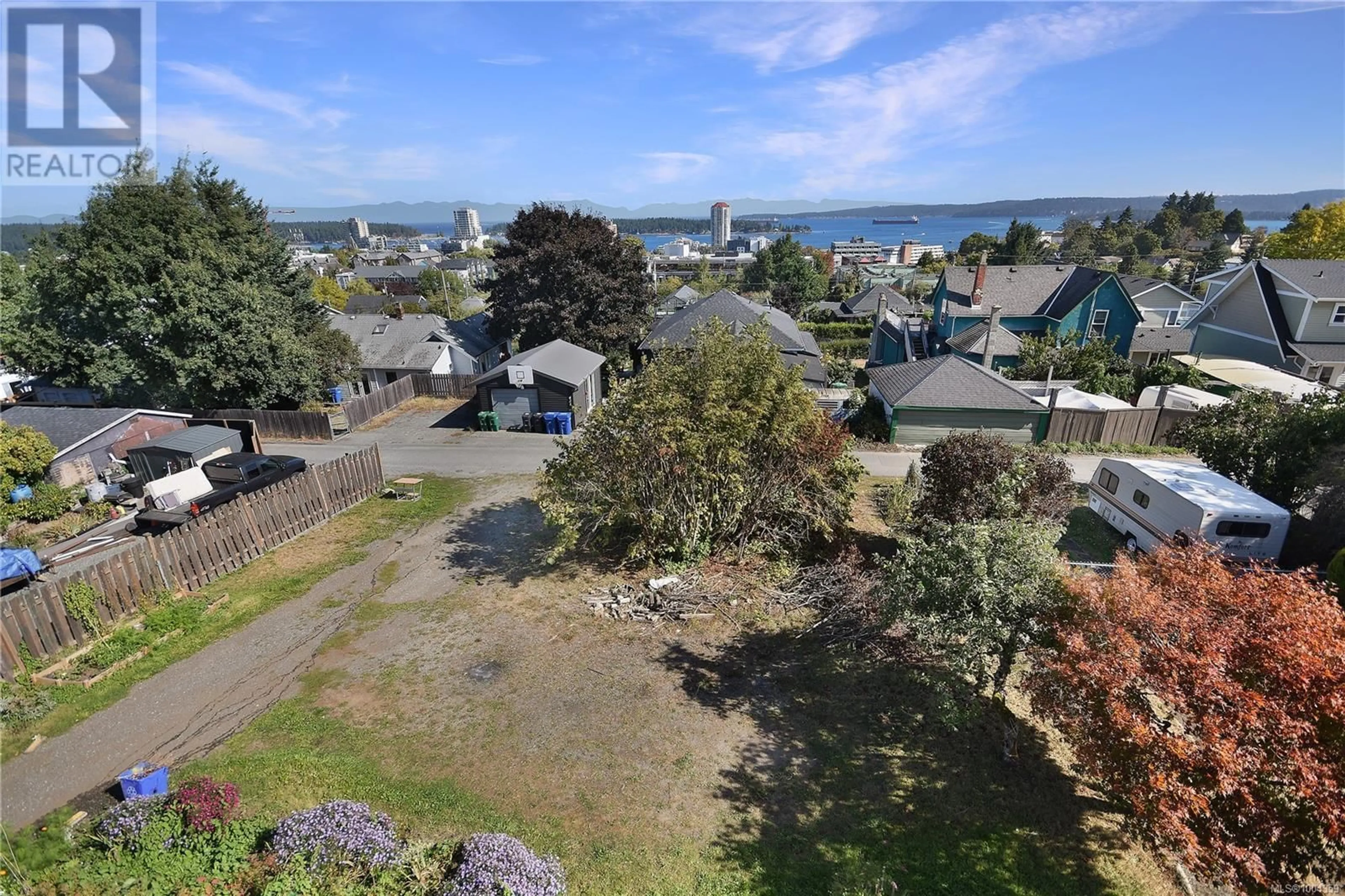 A pic from outside/outdoor area/front of a property/back of a property/a pic from drone, water/lake/river/ocean view for 418 KENNEDY STREET, Nanaimo British Columbia V9R2J5