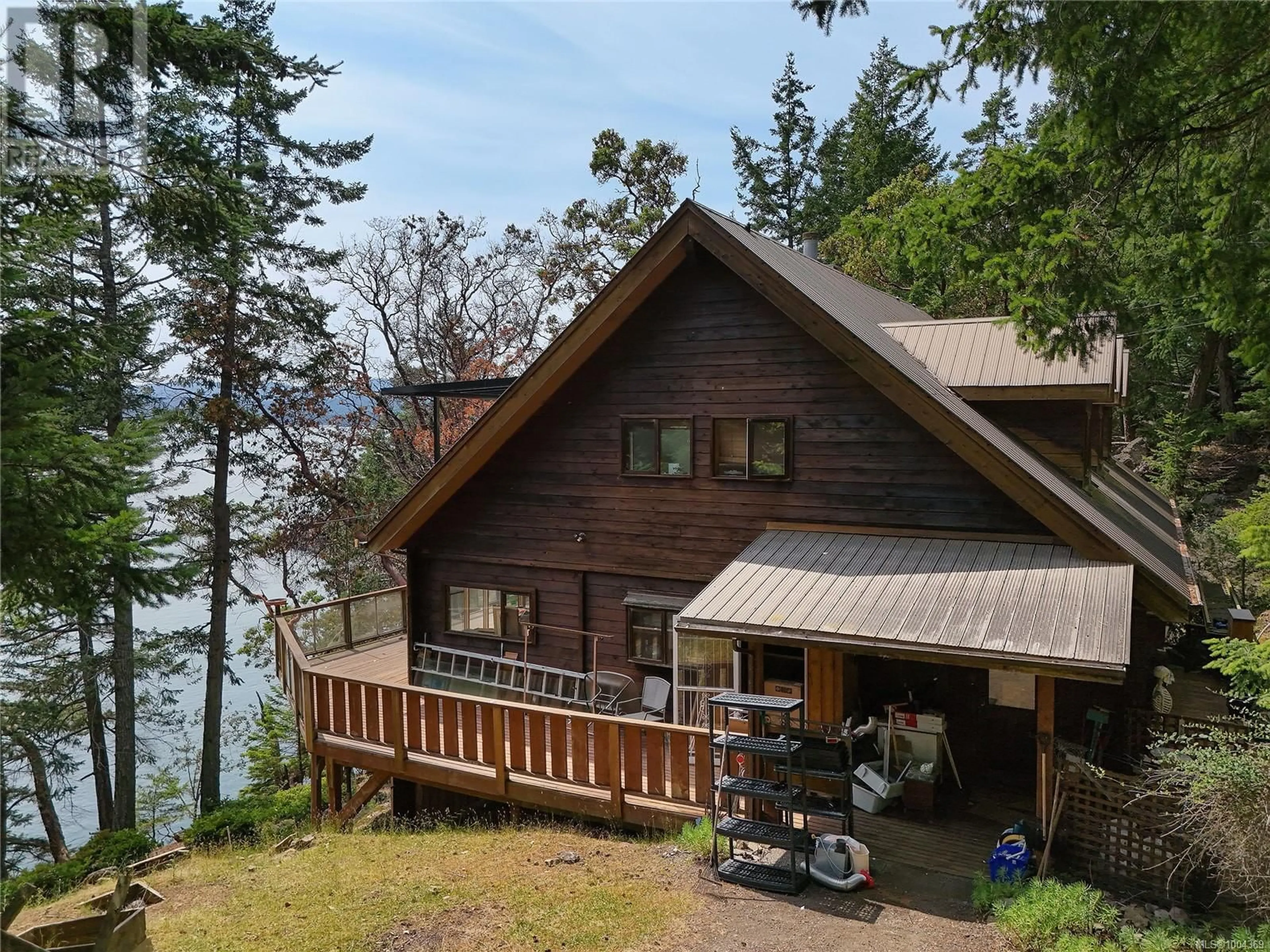 A pic from outside/outdoor area/front of a property/back of a property/a pic from drone, water/lake/river/ocean view for 330 EAST WEST ROAD, Mayne Island British Columbia V0N2J2