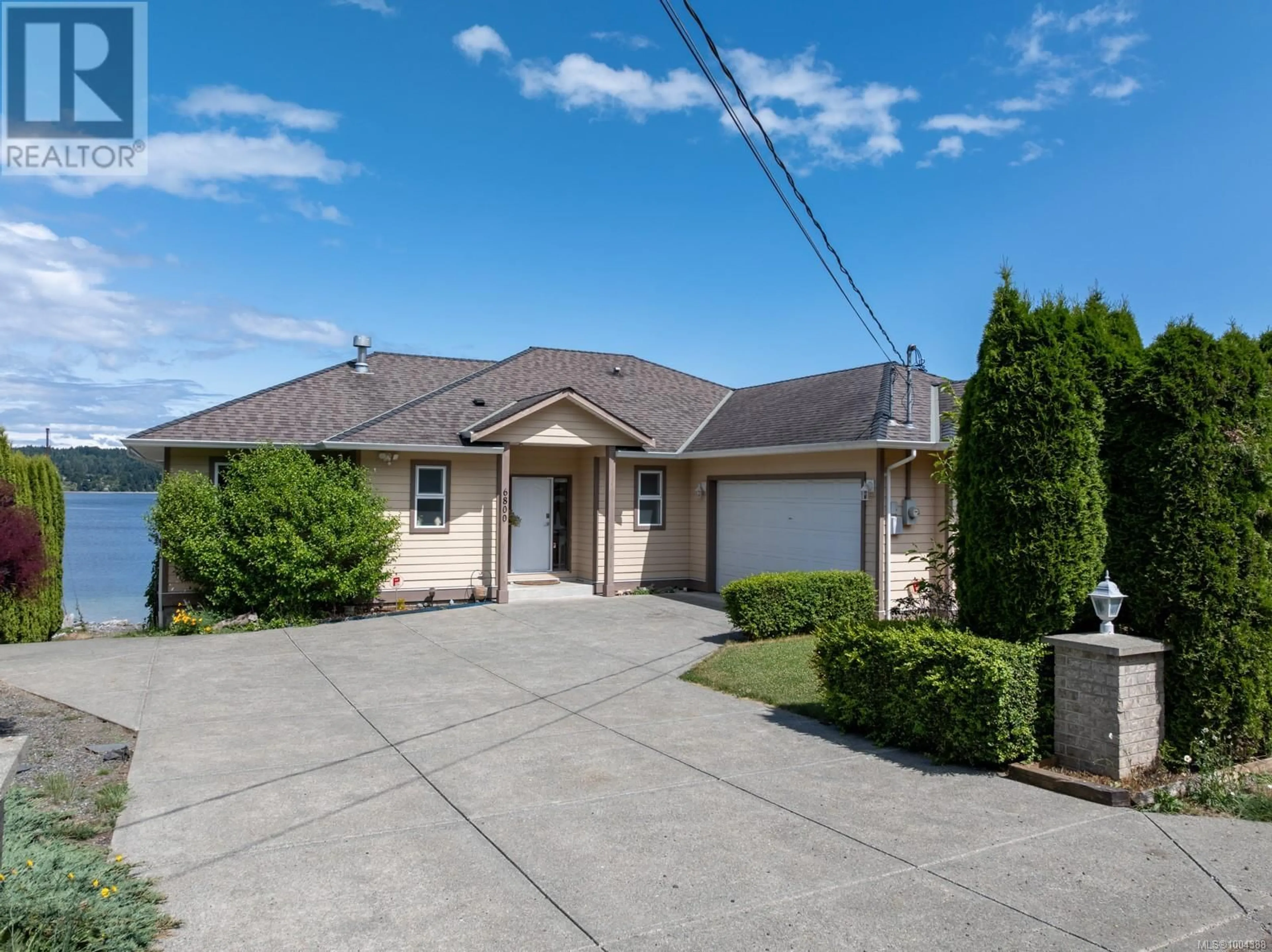 A pic from outside/outdoor area/front of a property/back of a property/a pic from drone, street for 6800 BUCKLEY BAY FRONTAGE ROAD, Fanny Bay British Columbia V0R1W0