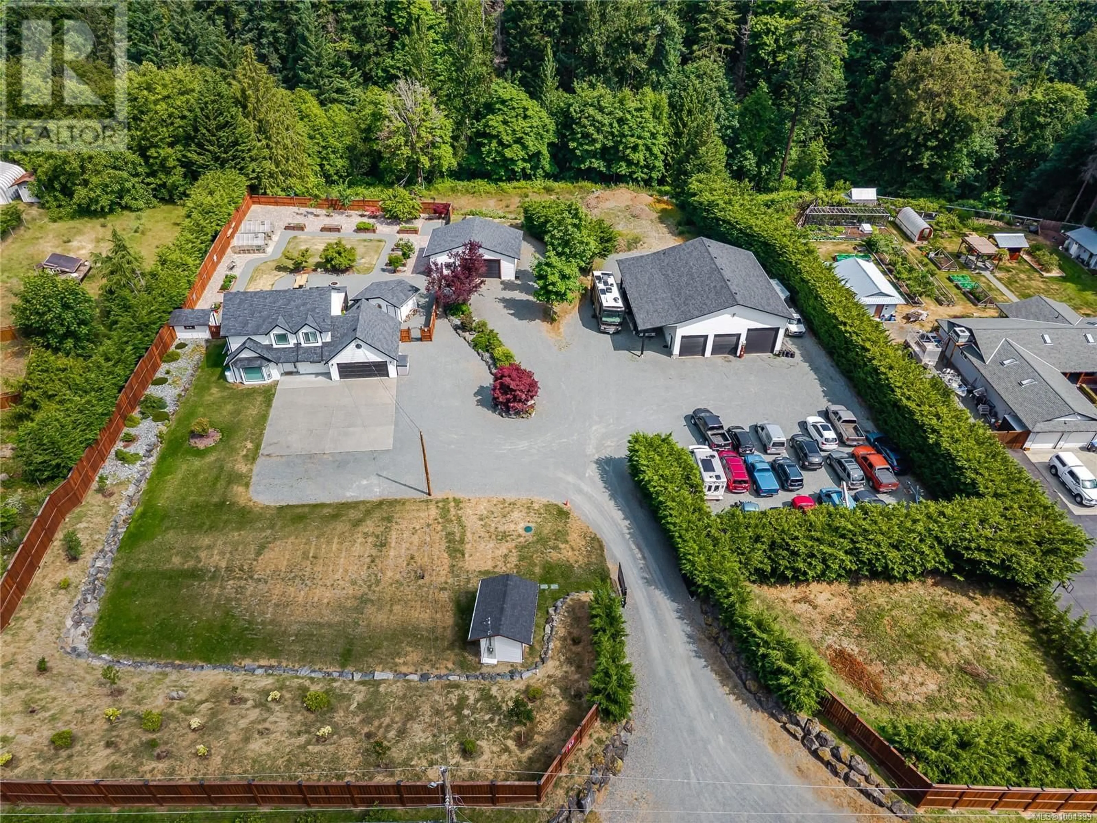 A pic from outside/outdoor area/front of a property/back of a property/a pic from drone, street for 3180 WEST ROAD, Nanaimo British Columbia V9R6X1