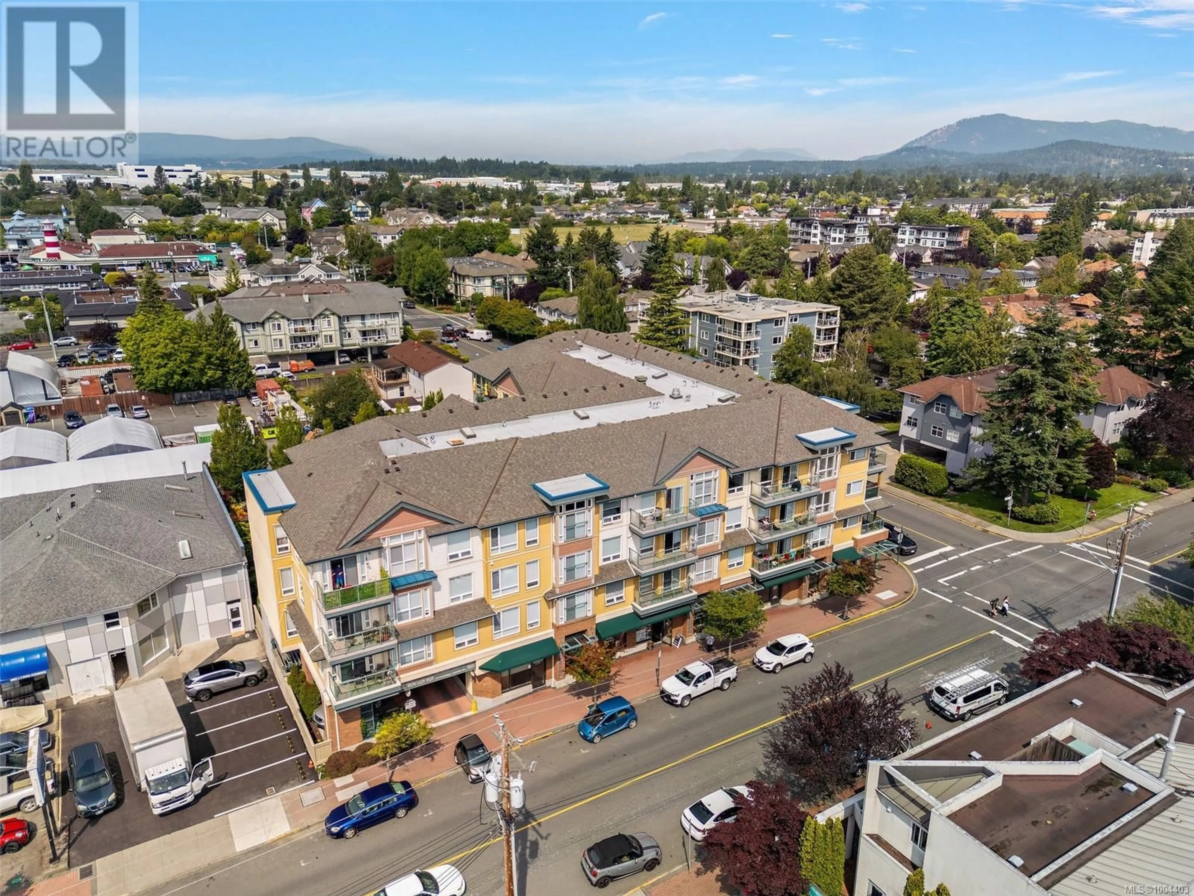 A pic from outside/outdoor area/front of a property/back of a property/a pic from drone, mountain view for 211 - 9840 FIFTH STREET, Sidney British Columbia V8L2X3