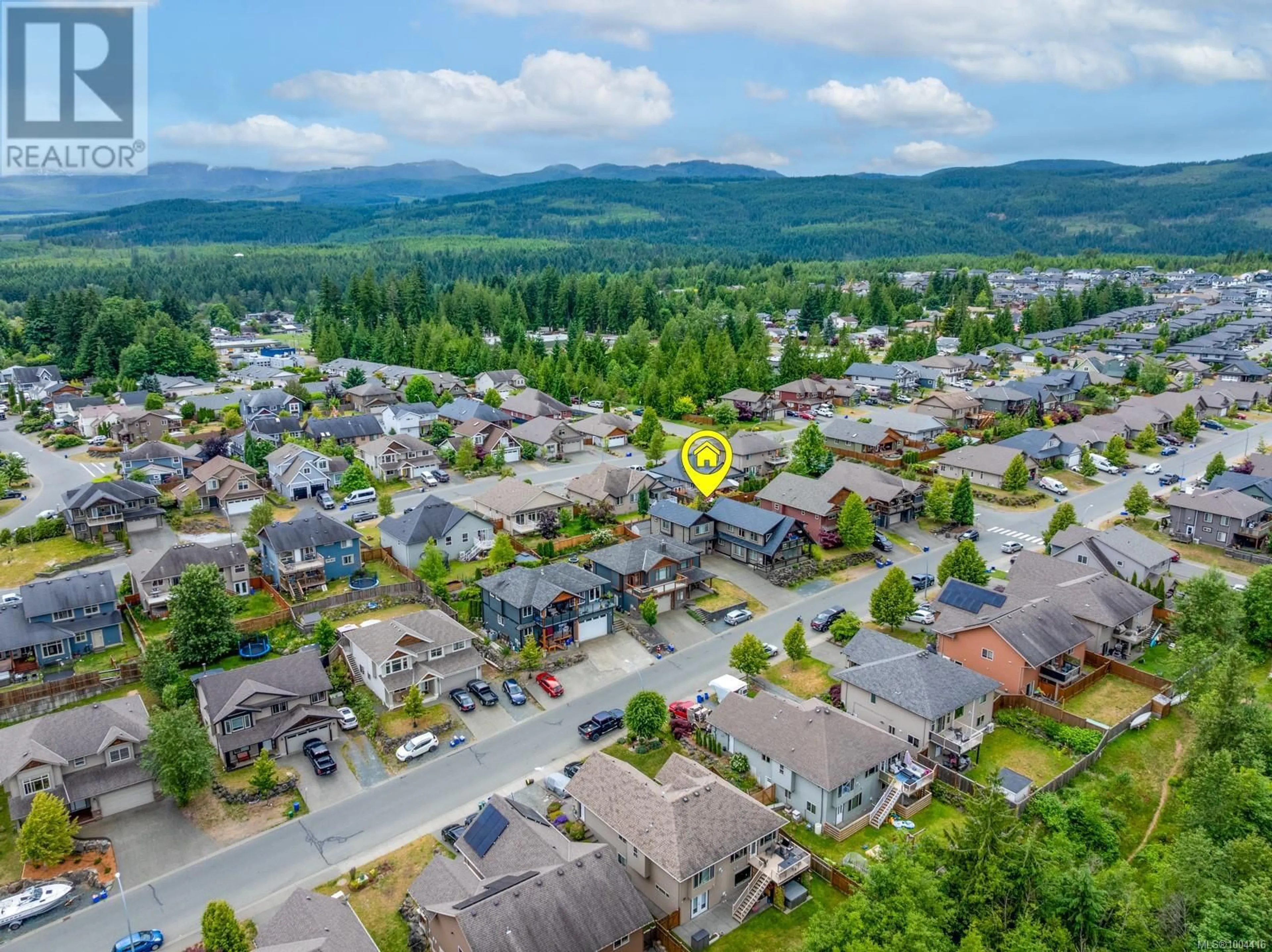 A pic from outside/outdoor area/front of a property/back of a property/a pic from drone, mountain view for 2673 KENDAL AVENUE, Cumberland British Columbia V0R1S0