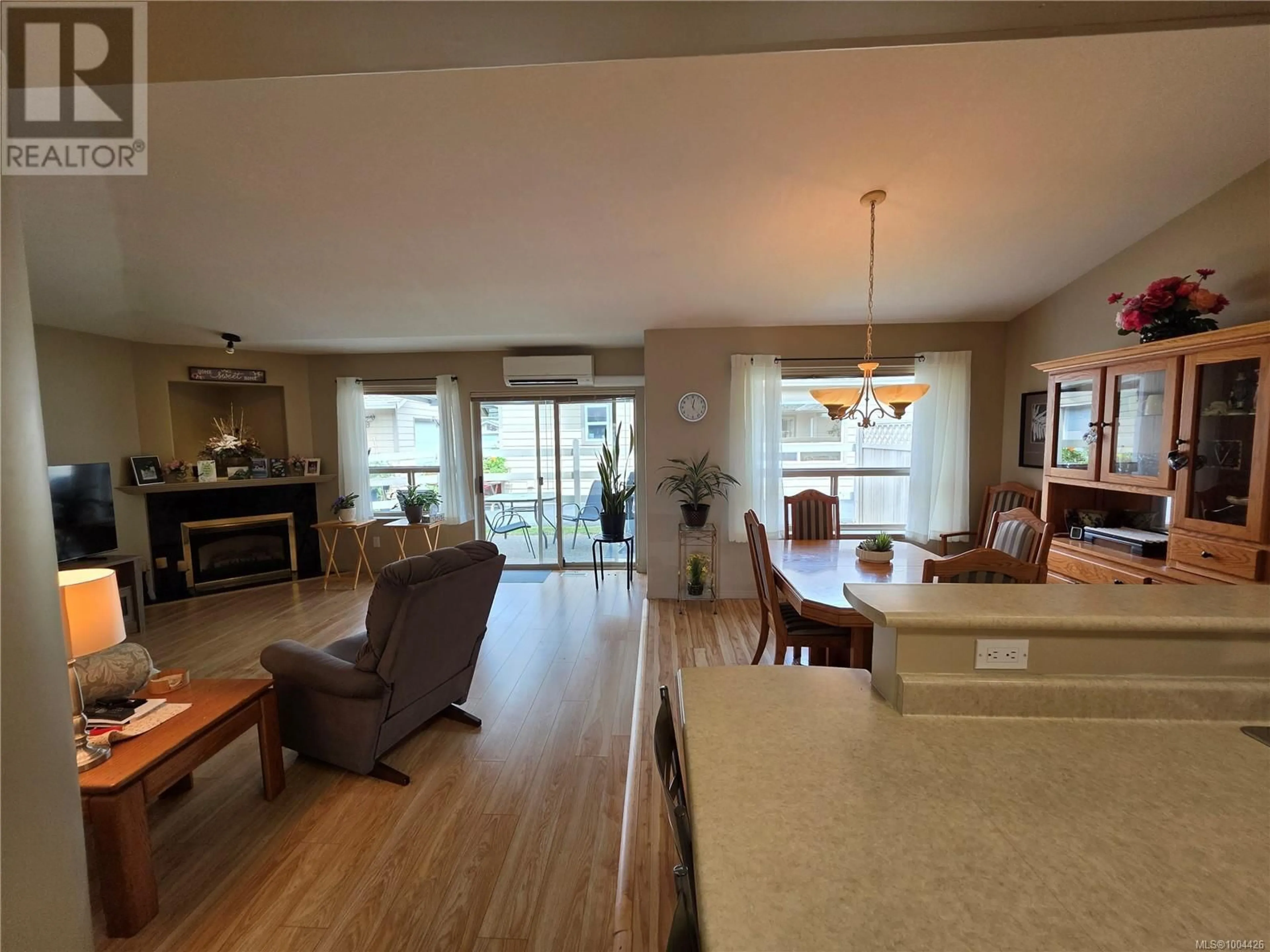 Open concept kitchen, wood/laminate floor for 2 - 5608 STRATHCONA STREET, Port Alberni British Columbia V9Y6X5