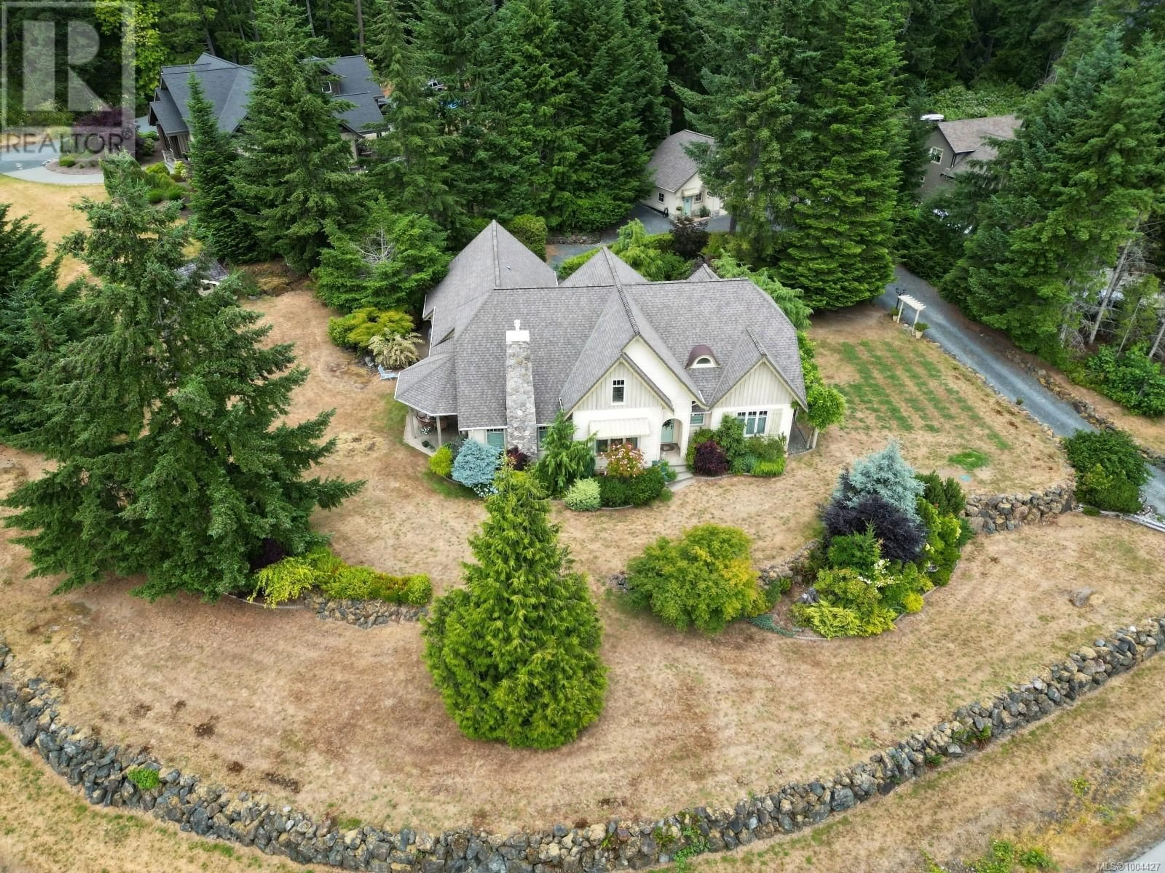 A pic from outside/outdoor area/front of a property/back of a property/a pic from drone, mountain view for 5479 HIGHLAND DRIVE, Port Alberni British Columbia V9Y7G7