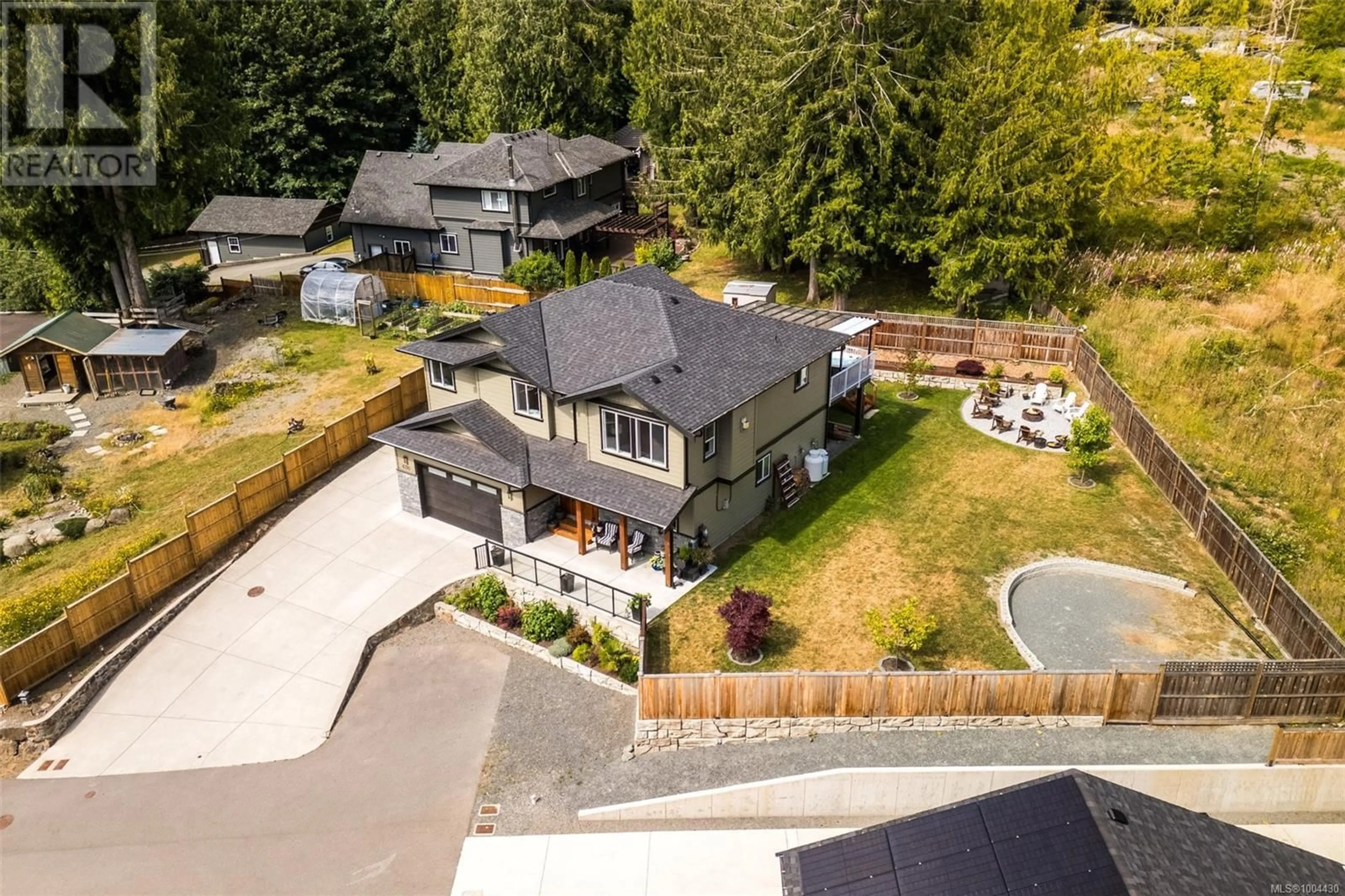 A pic from outside/outdoor area/front of a property/back of a property/a pic from drone, street for 6710 HELGESEN ROAD, Sooke British Columbia V9Z0V6