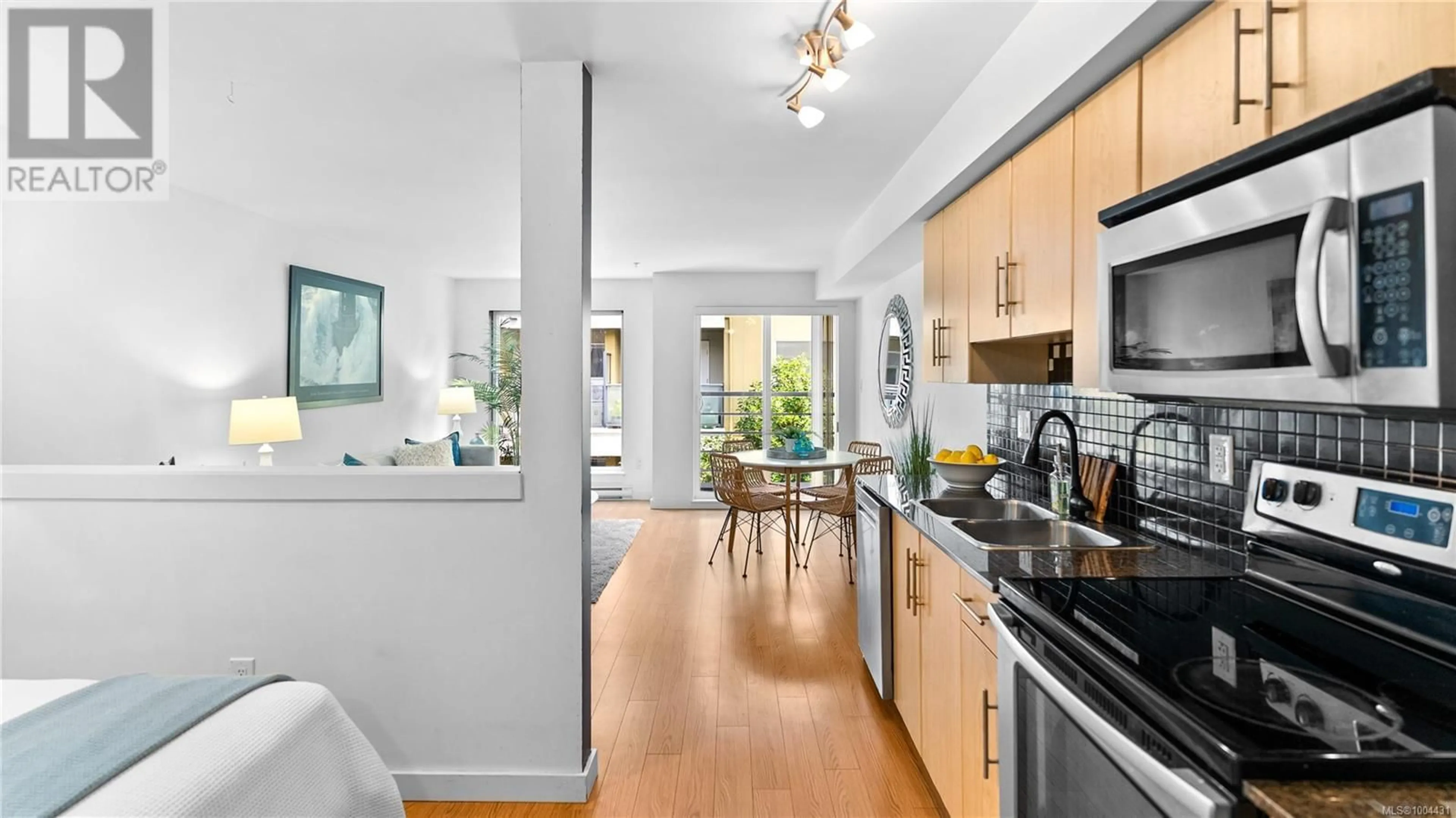 Open concept kitchen, unknown for 406 - 1405 ESQUIMALT ROAD, Esquimalt British Columbia V9A0A4