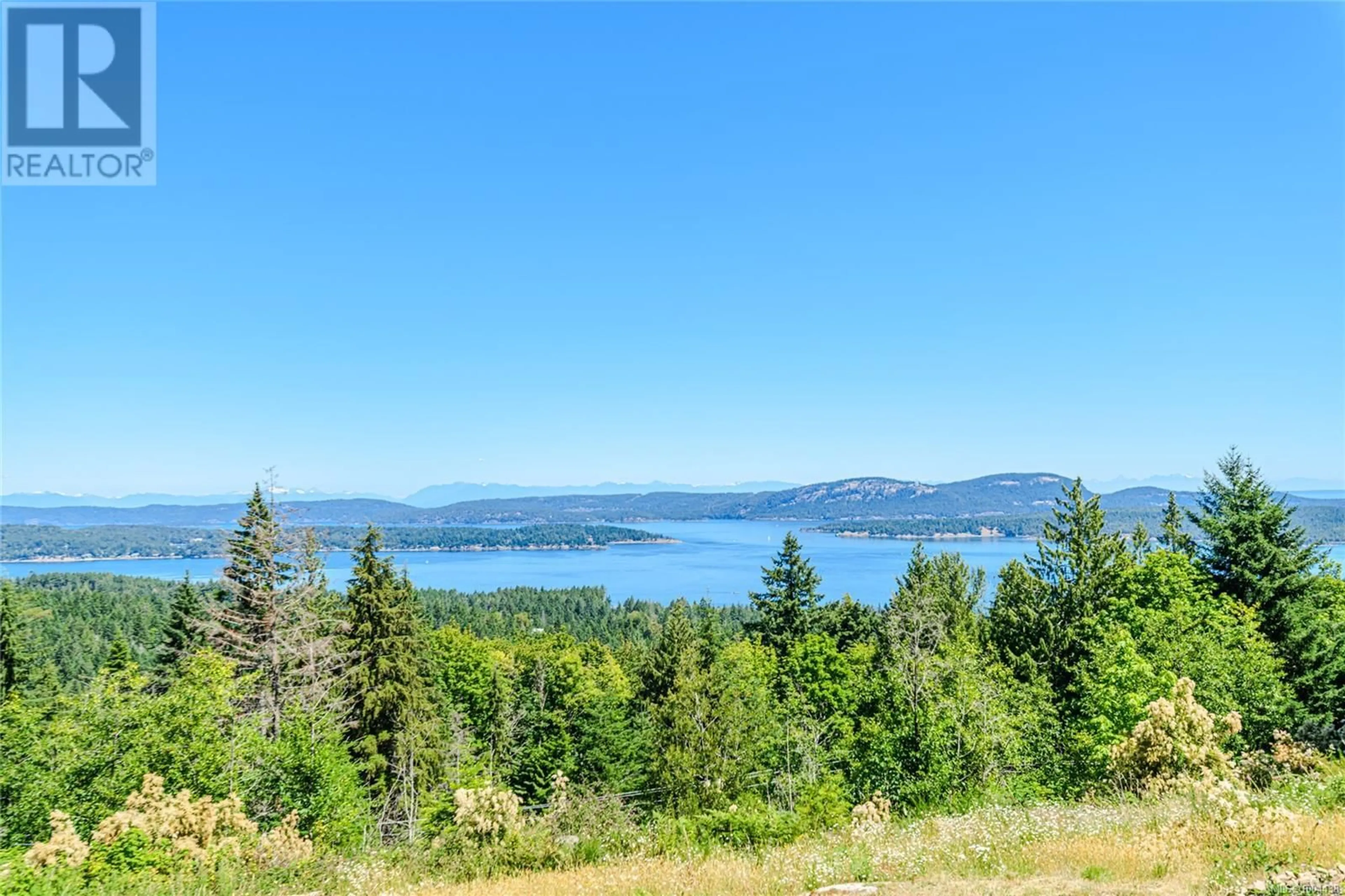 A pic from outside/outdoor area/front of a property/back of a property/a pic from drone, water/lake/river/ocean view for 412 STEWART ROAD, Salt Spring British Columbia V8K1Y6