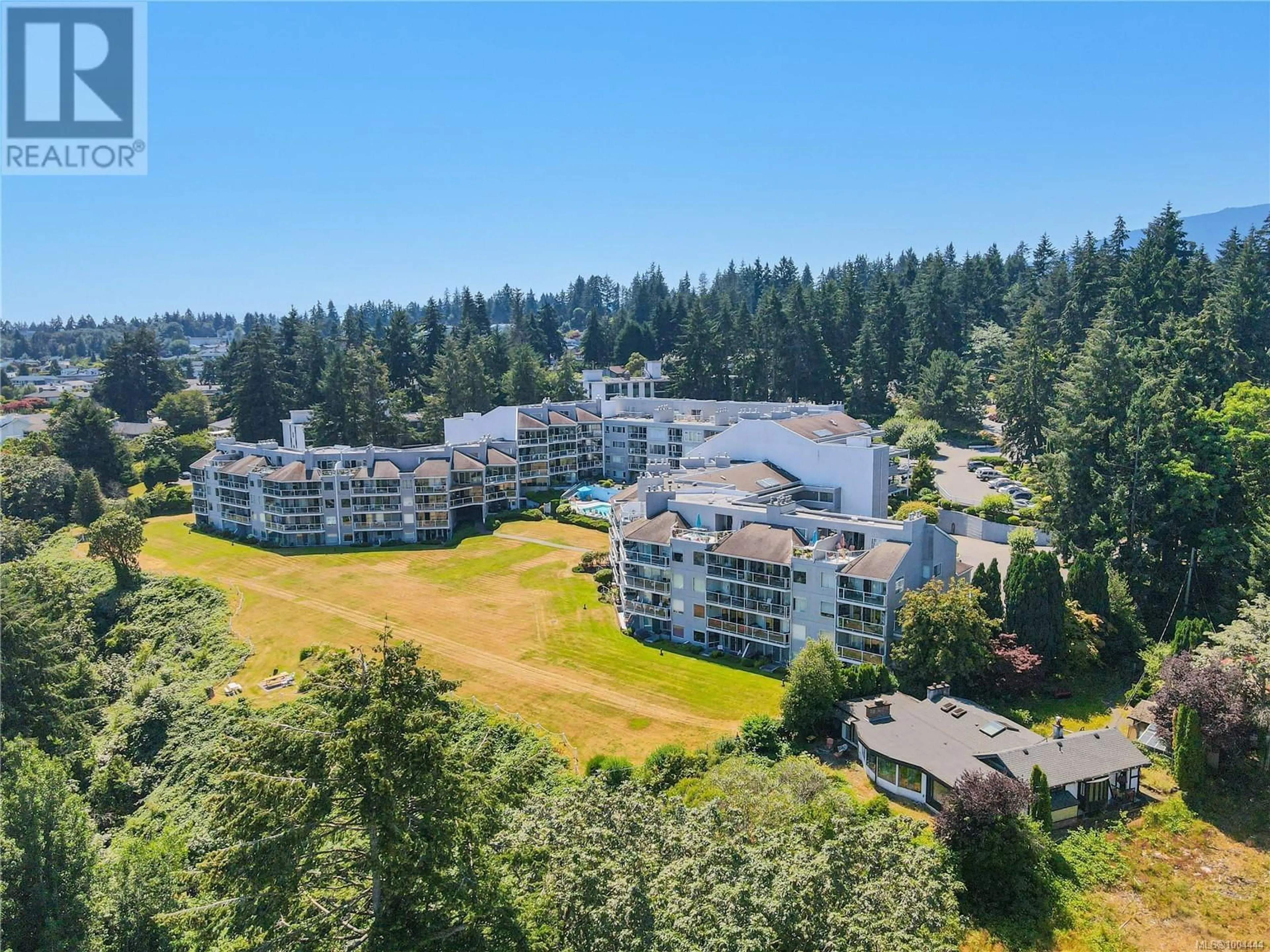 A pic from outside/outdoor area/front of a property/back of a property/a pic from drone, water/lake/river/ocean view for 312 - 2560 DEPARTURE BAY ROAD, Nanaimo British Columbia V9S5P1