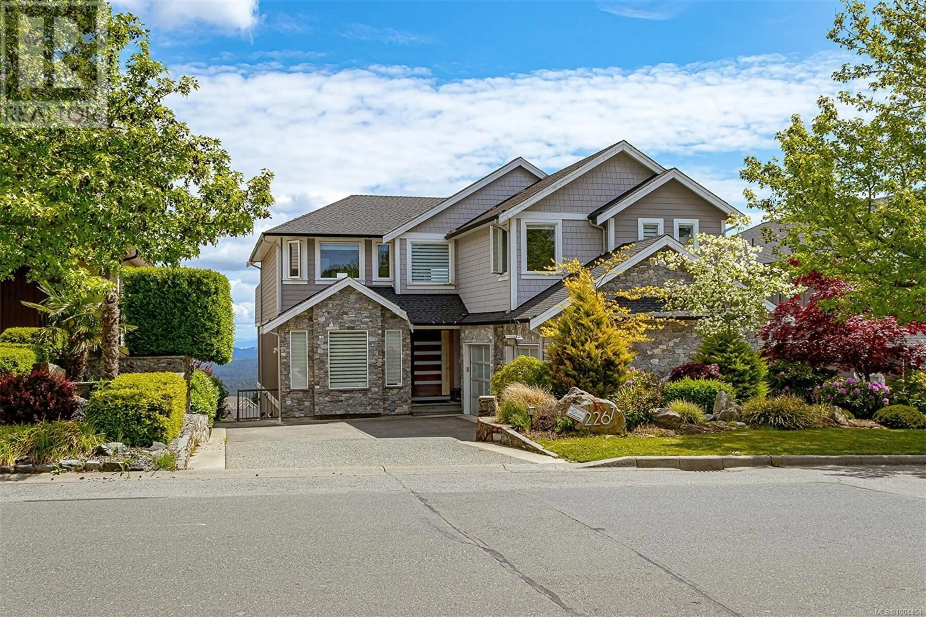 Home with vinyl exterior material, street for 2267 NICKLAUS DRIVE, Langford British Columbia V9B0L2