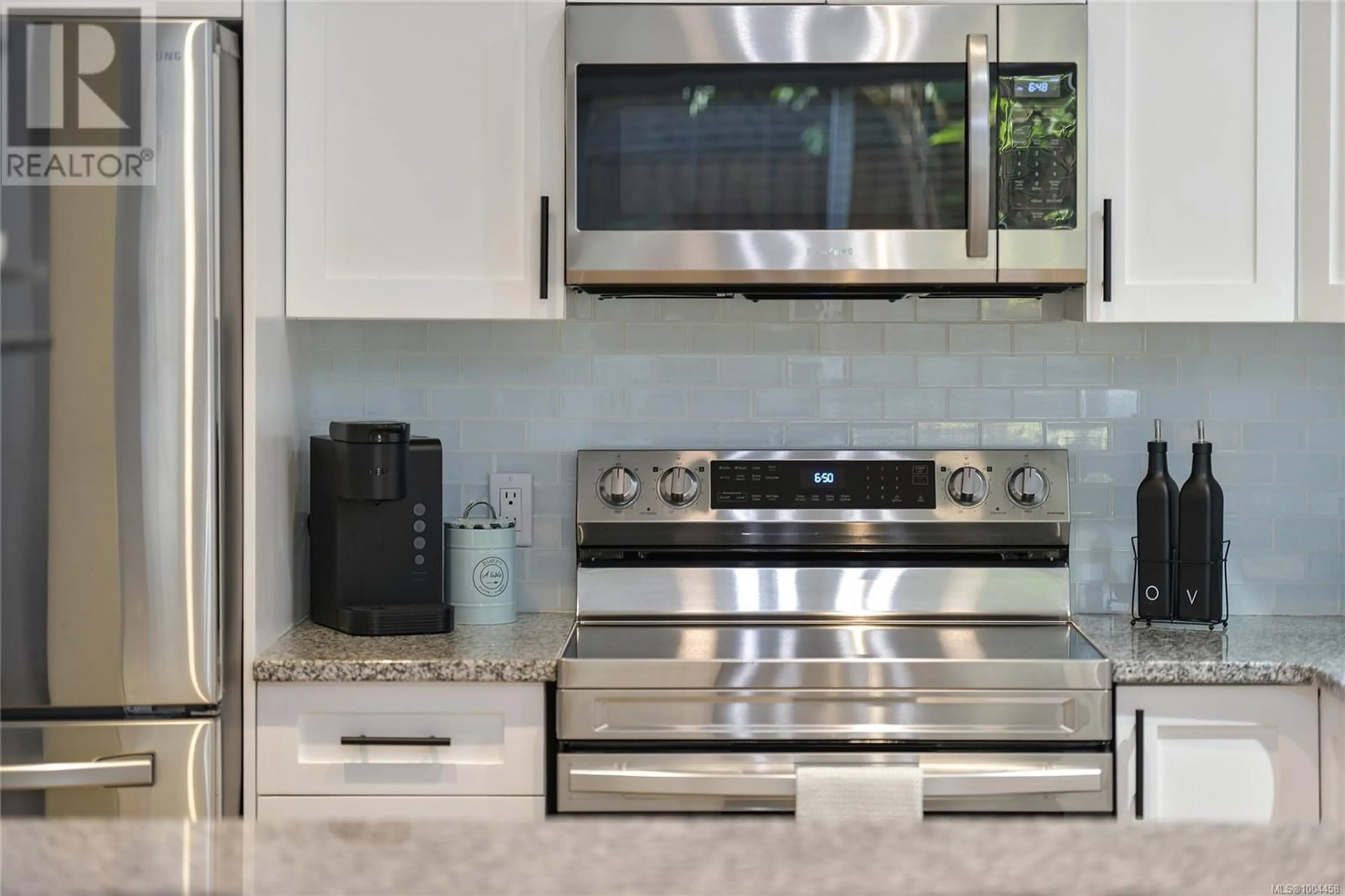 Contemporary kitchen, ceramic/tile floor for 973 HUCKLEBERRY TERRACE, Langford British Columbia V9C0A7