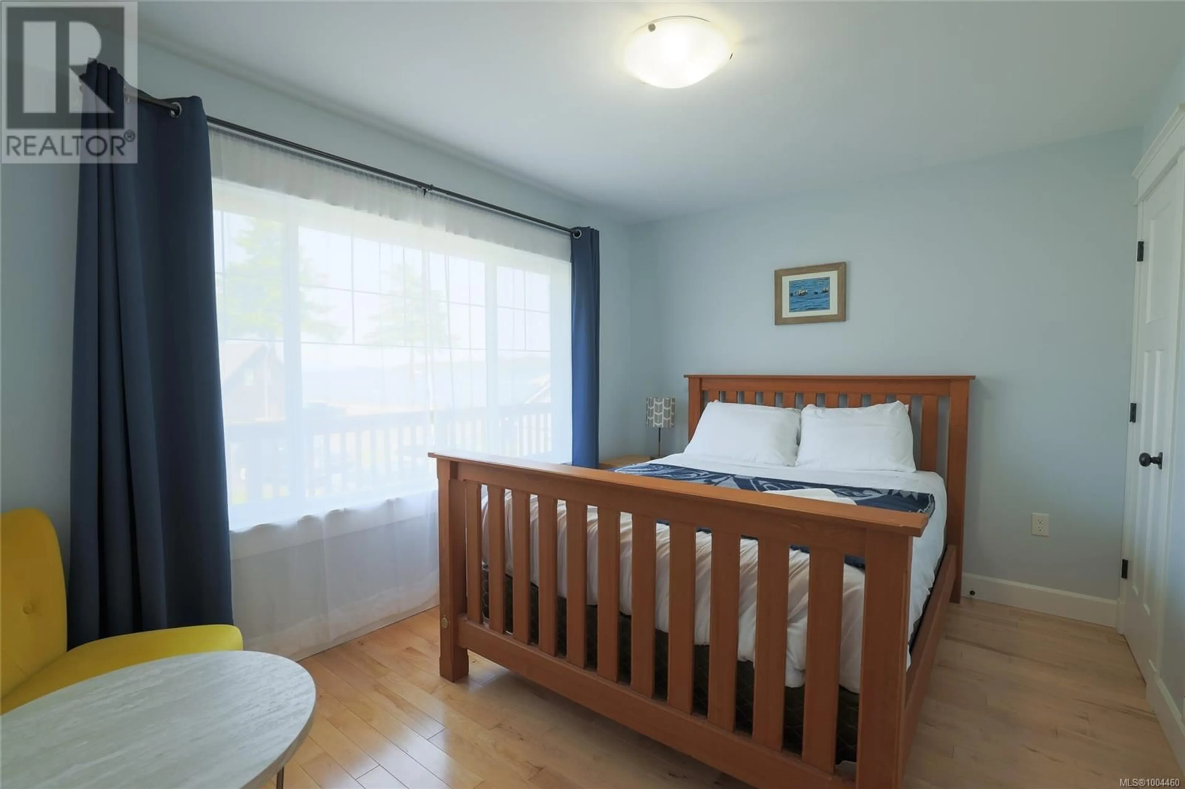 Bedroom with bed, wood/laminate floor for 8721 TELCO STREET, Port Hardy British Columbia V0N2P0