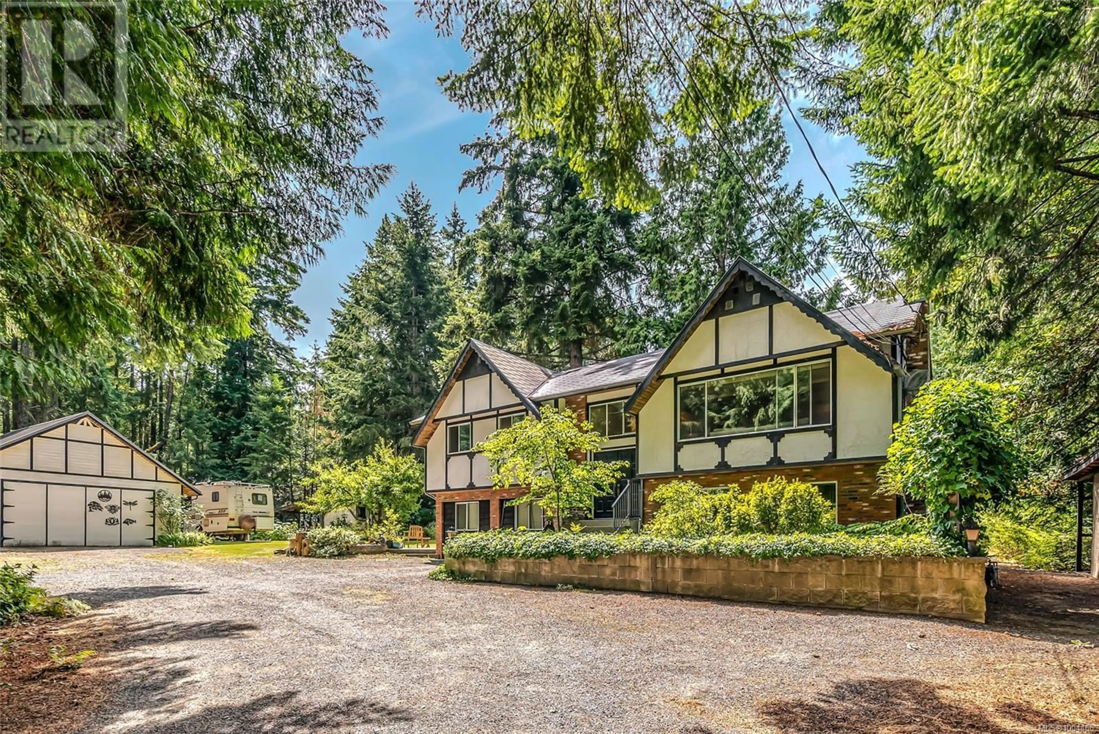 A pic from outside/outdoor area/front of a property/back of a property/a pic from drone, mountain view for 6863 EASTWIND DRIVE, Lantzville British Columbia V0R2H0