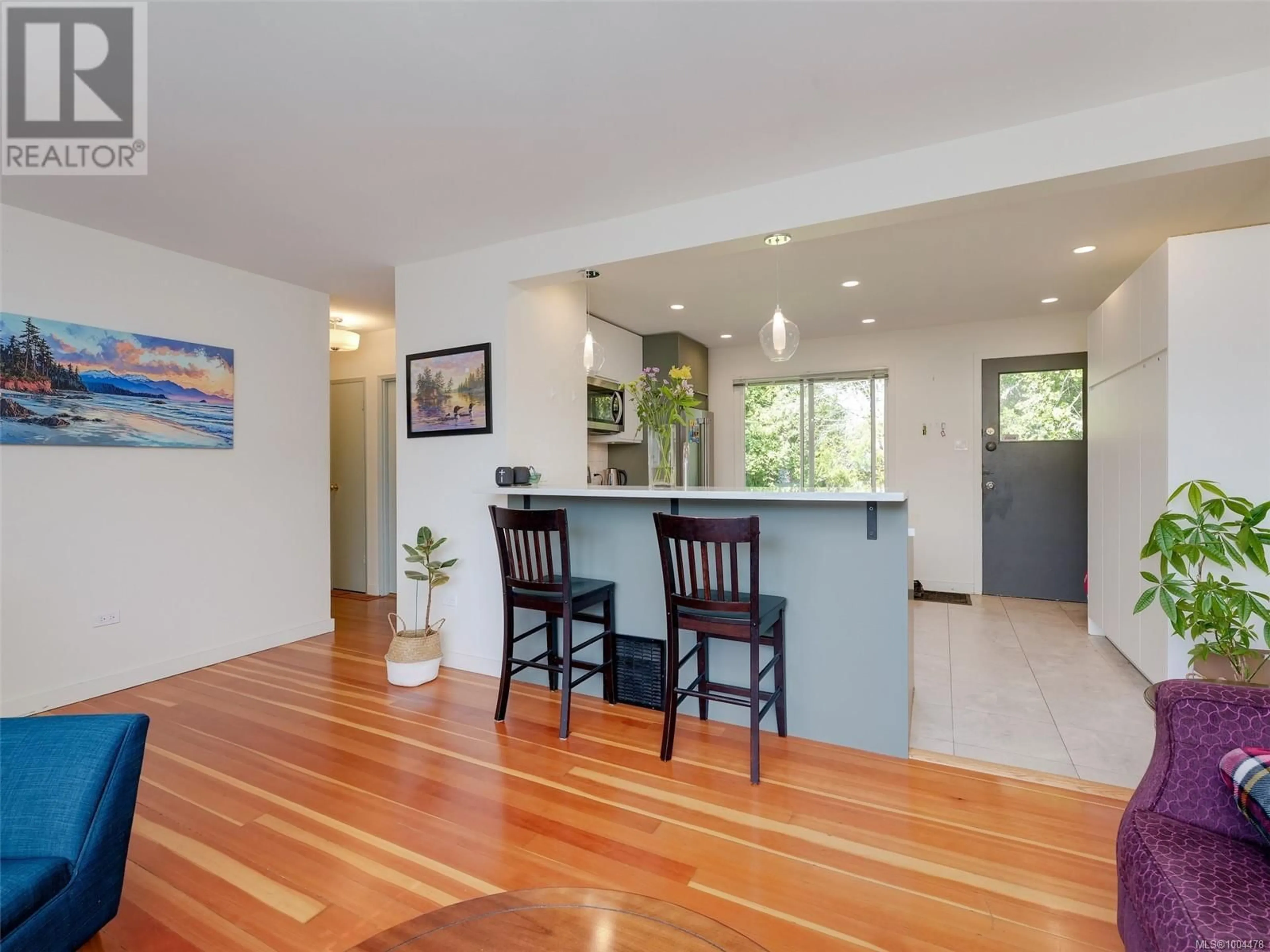 Open concept kitchen, wood/laminate floor for 1728 FOUL BAY ROAD, Victoria British Columbia V8R5A4