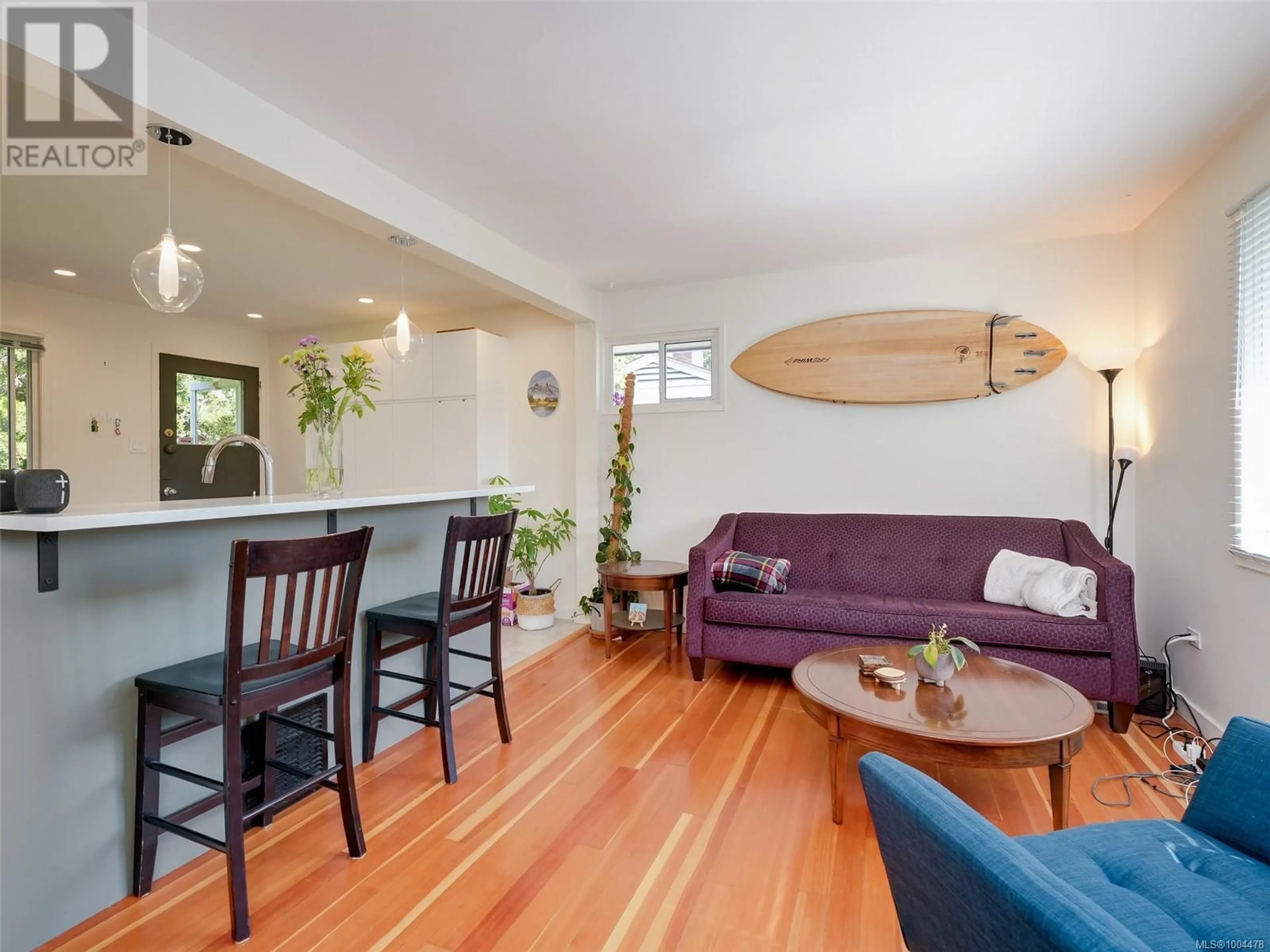 Living room with furniture, wood/laminate floor for 1728 FOUL BAY ROAD, Victoria British Columbia V8R5A4
